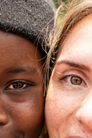 Close-up of two people's faces side-by-side