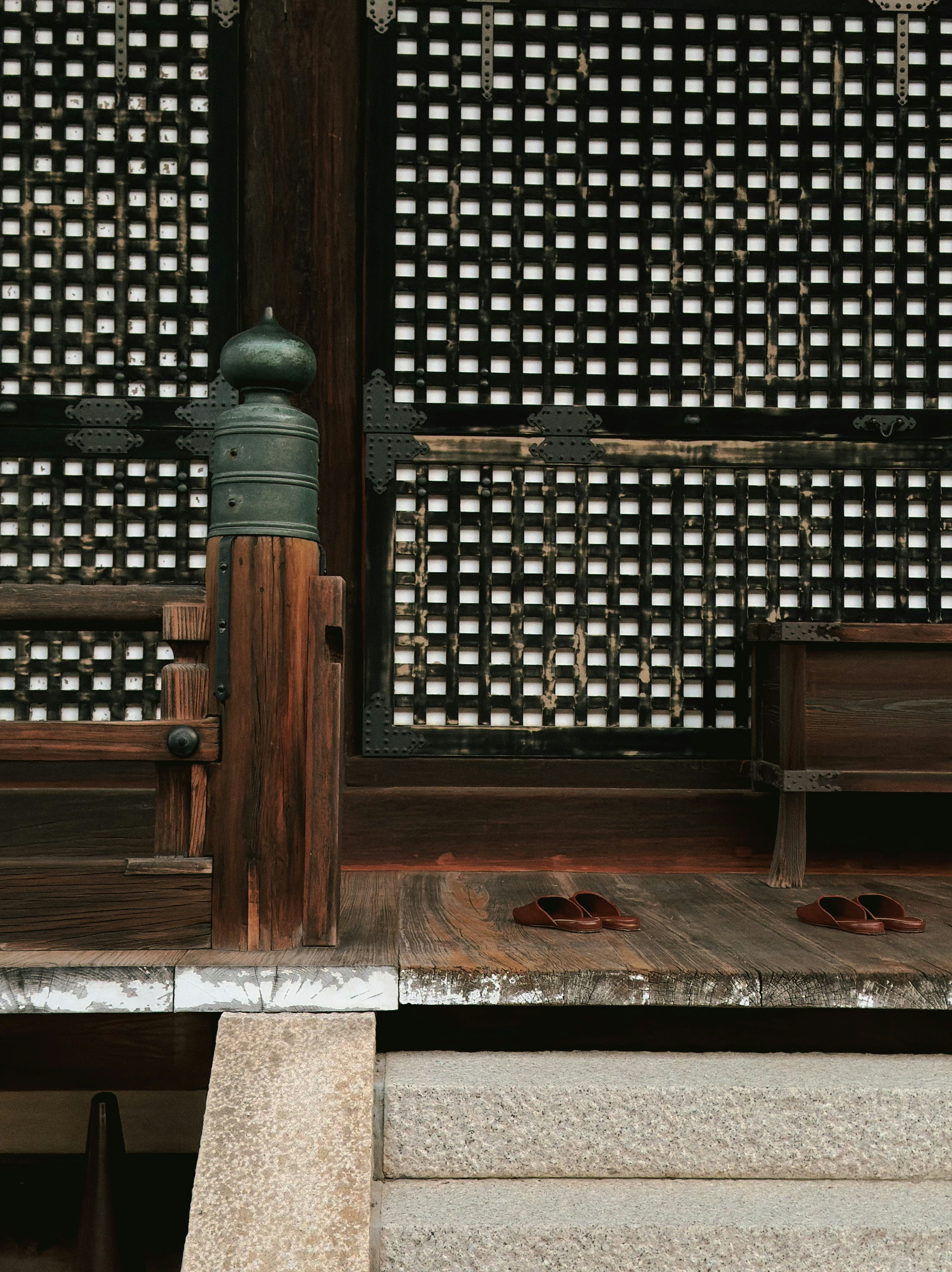 Traditional japanese wooden building with lattice doors
