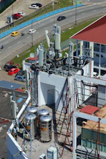 Rooftop antennas and communication equipment on a building.