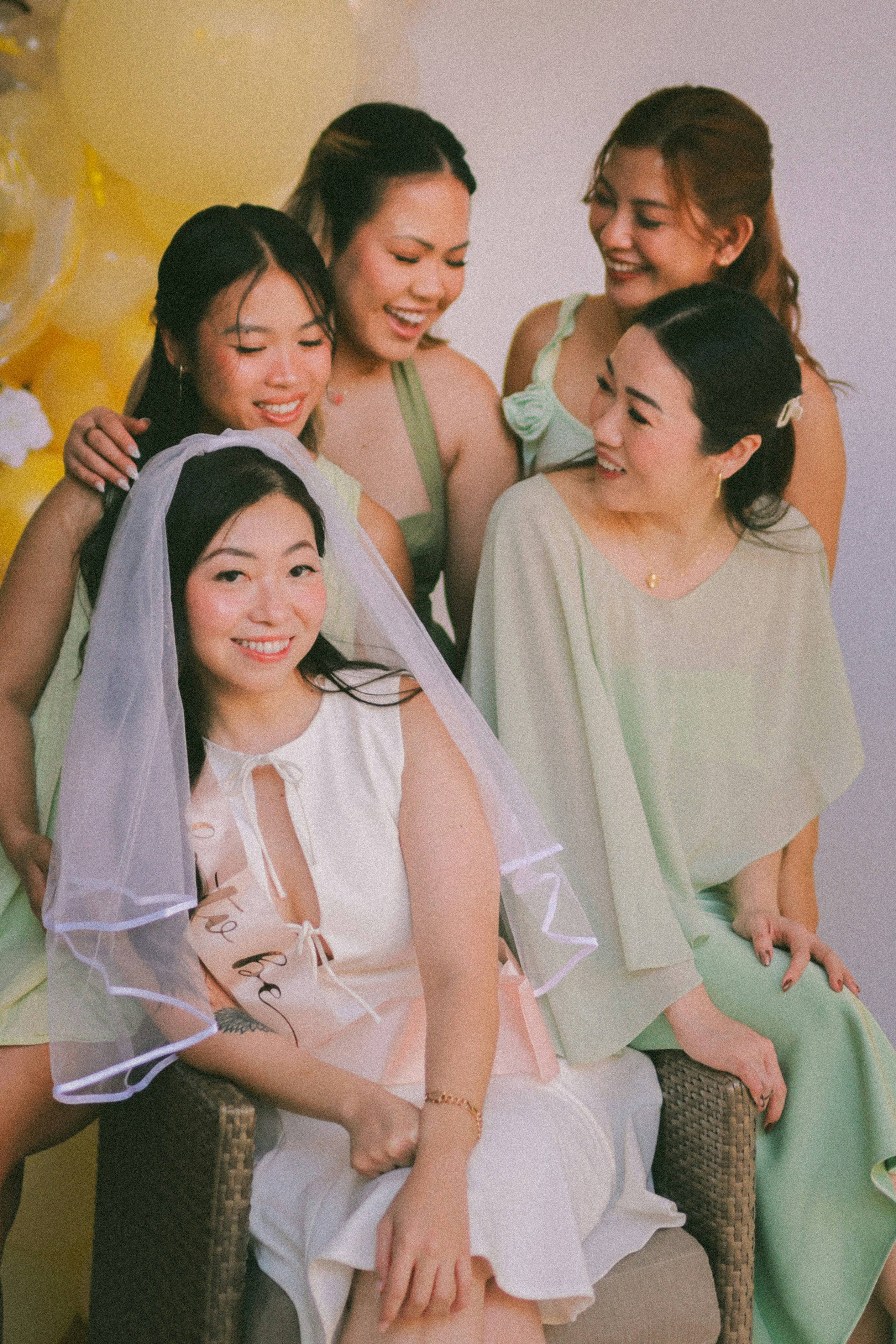 Bride and bridesmaids celebrating at a bridal shower