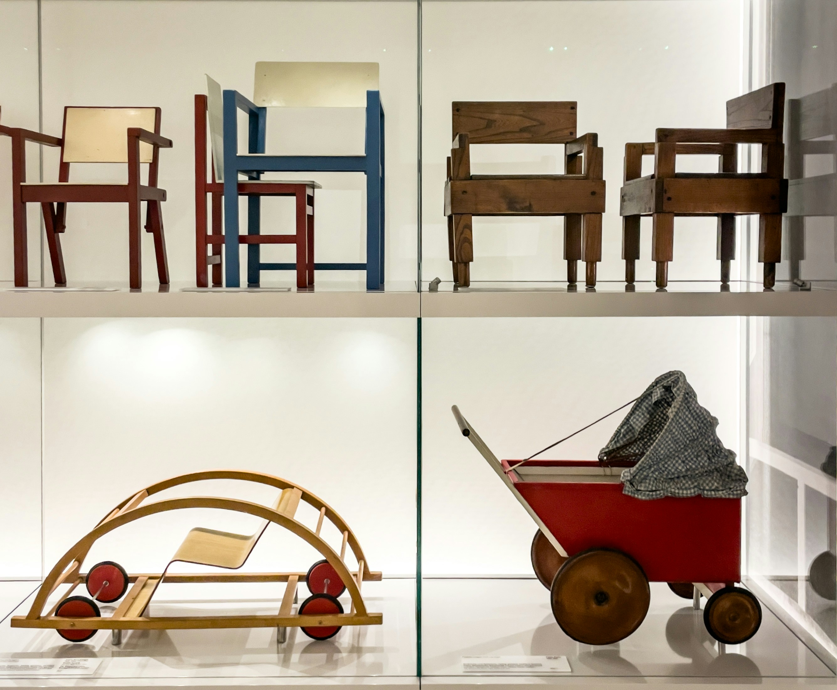 Collection of vintage chairs and children's toys