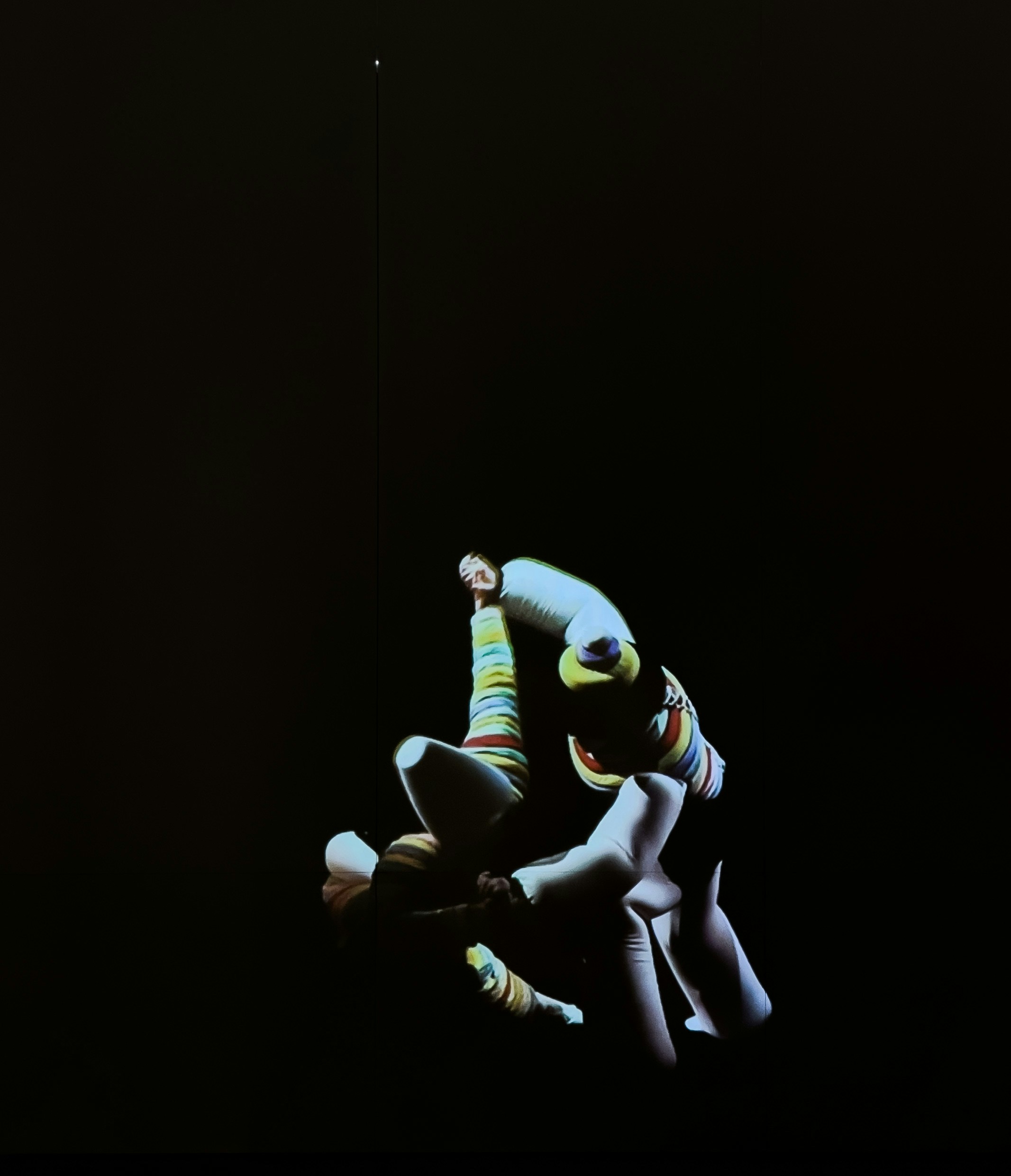 Abstract colorful shapes against a black background