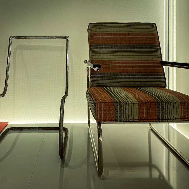 Two modern chairs with chrome frames and striped upholstery on display at the Bauhaus-Museum Weimar