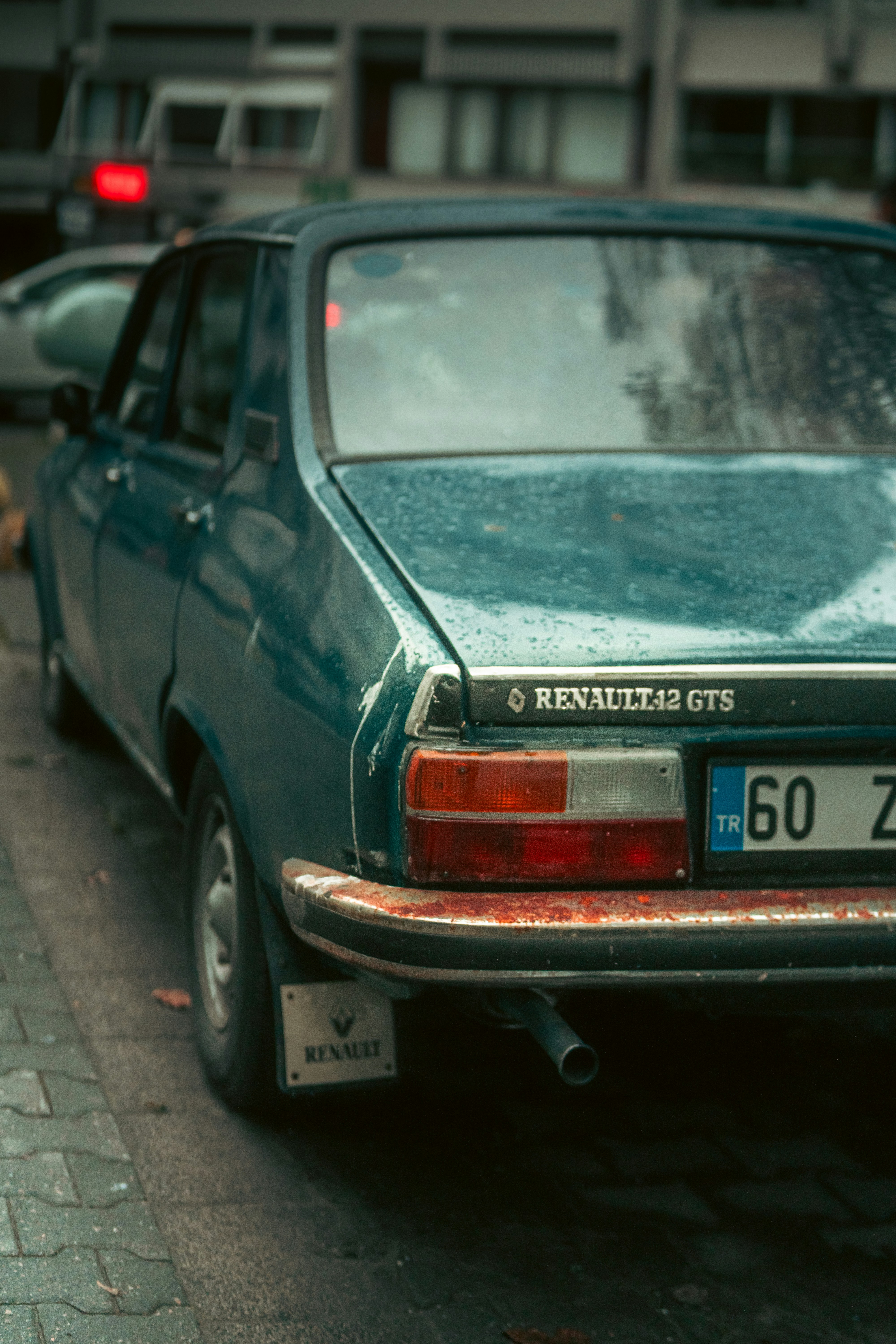 Rear view of a vintage teal renault 12
