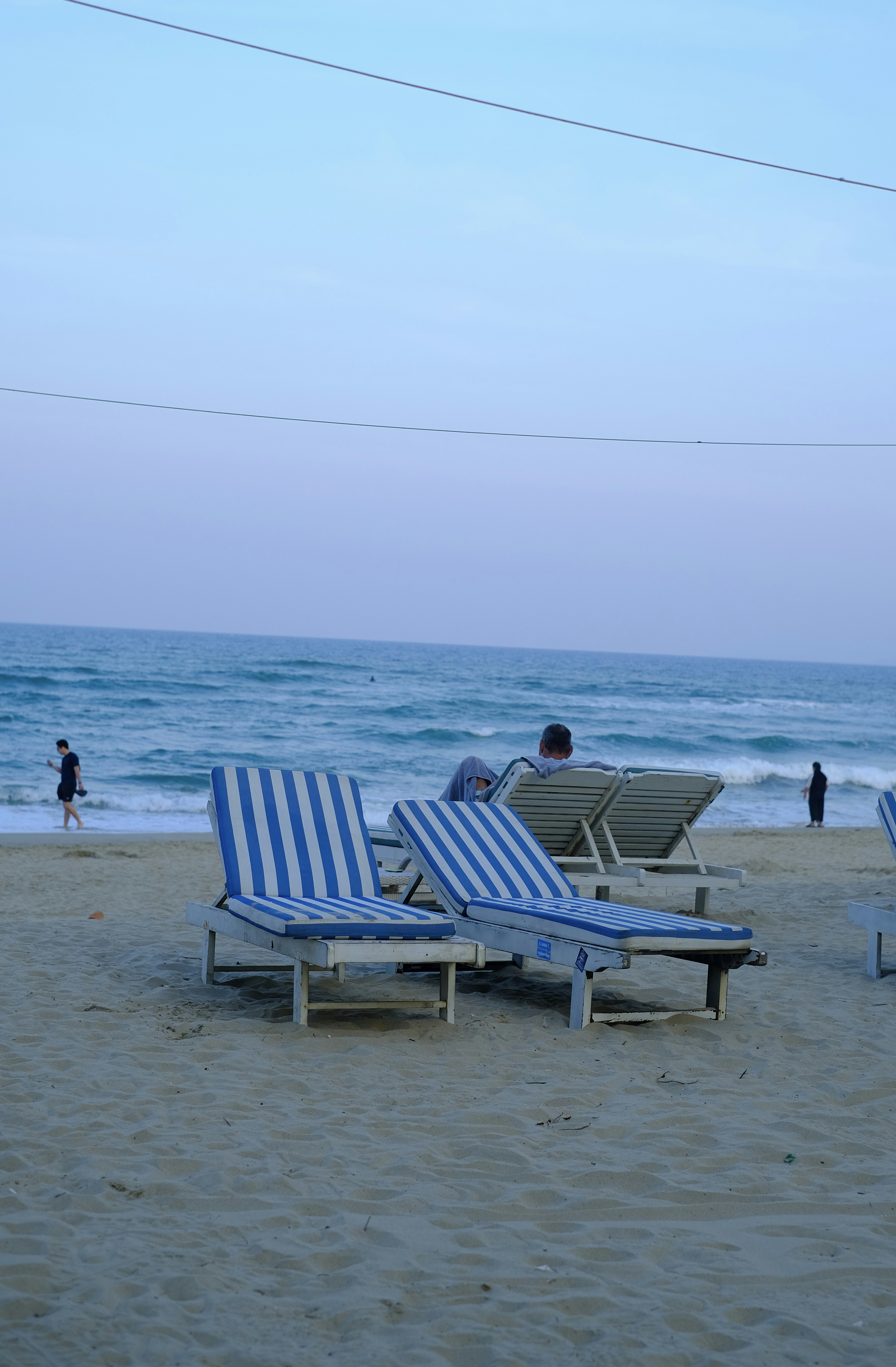Beach chairs with ocean in the background