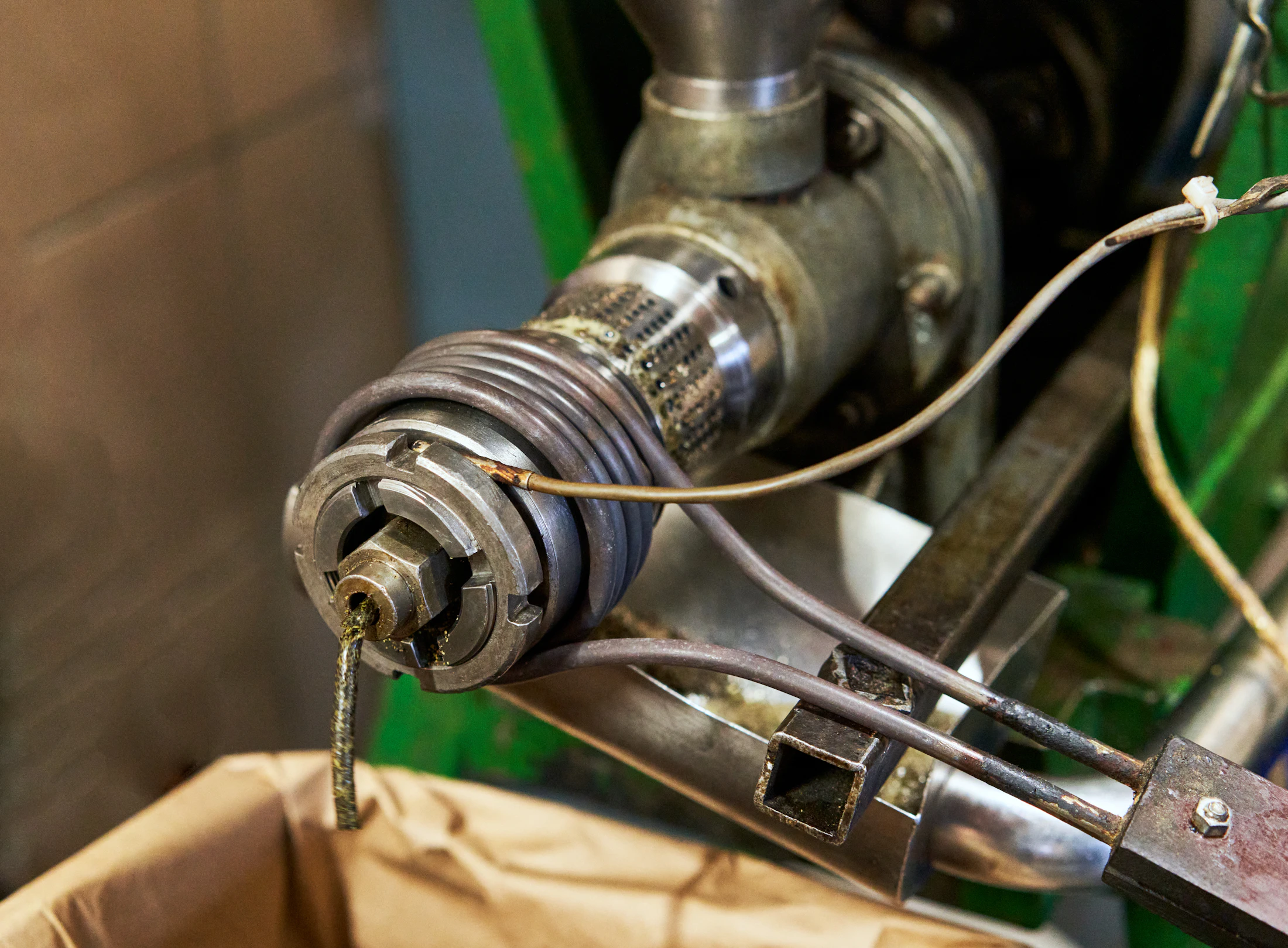 Plastic extrusion machine processing material in a factory