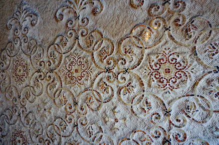 Intricate mosaic pattern with floral and geometric designs