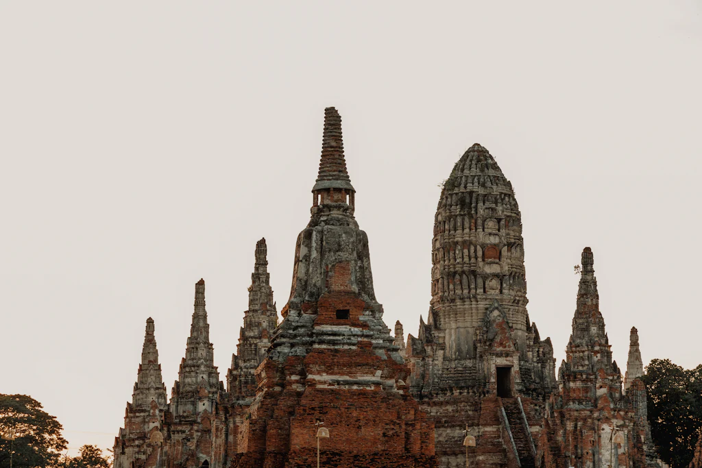 Brick prangs and weathered towers at Wat Chaiwatthanaram in Ayutthaya