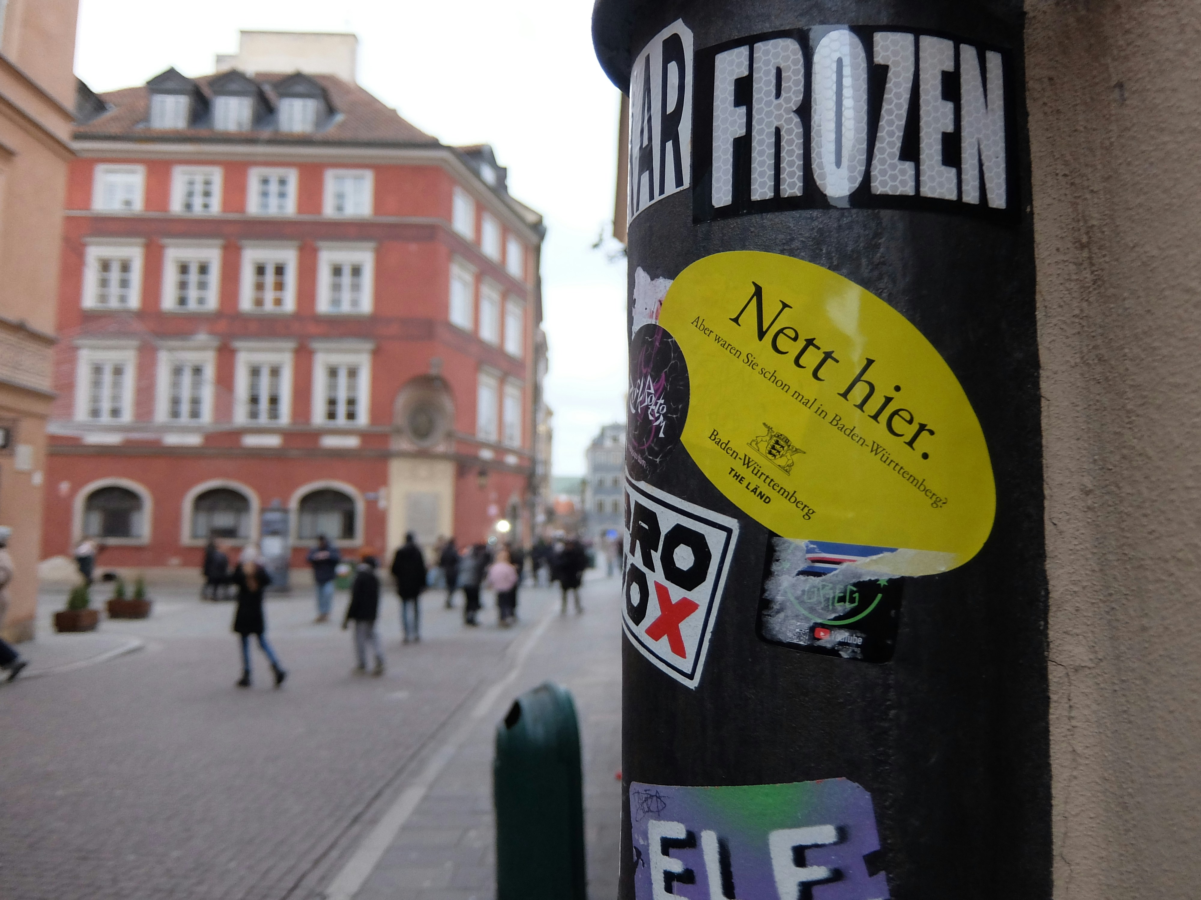 Street scene with buildings and people walking