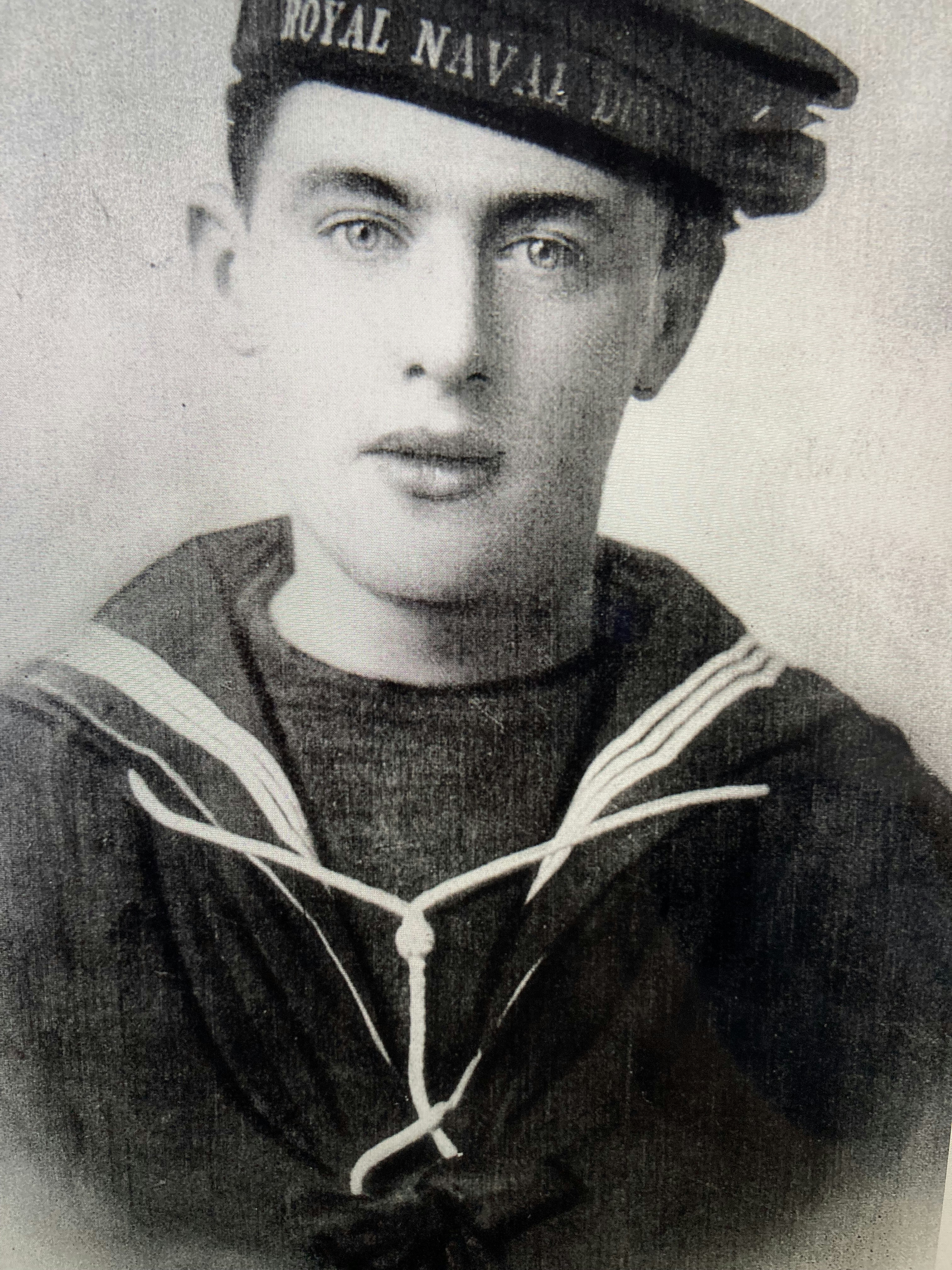 Young man in royal navy uniform and cap