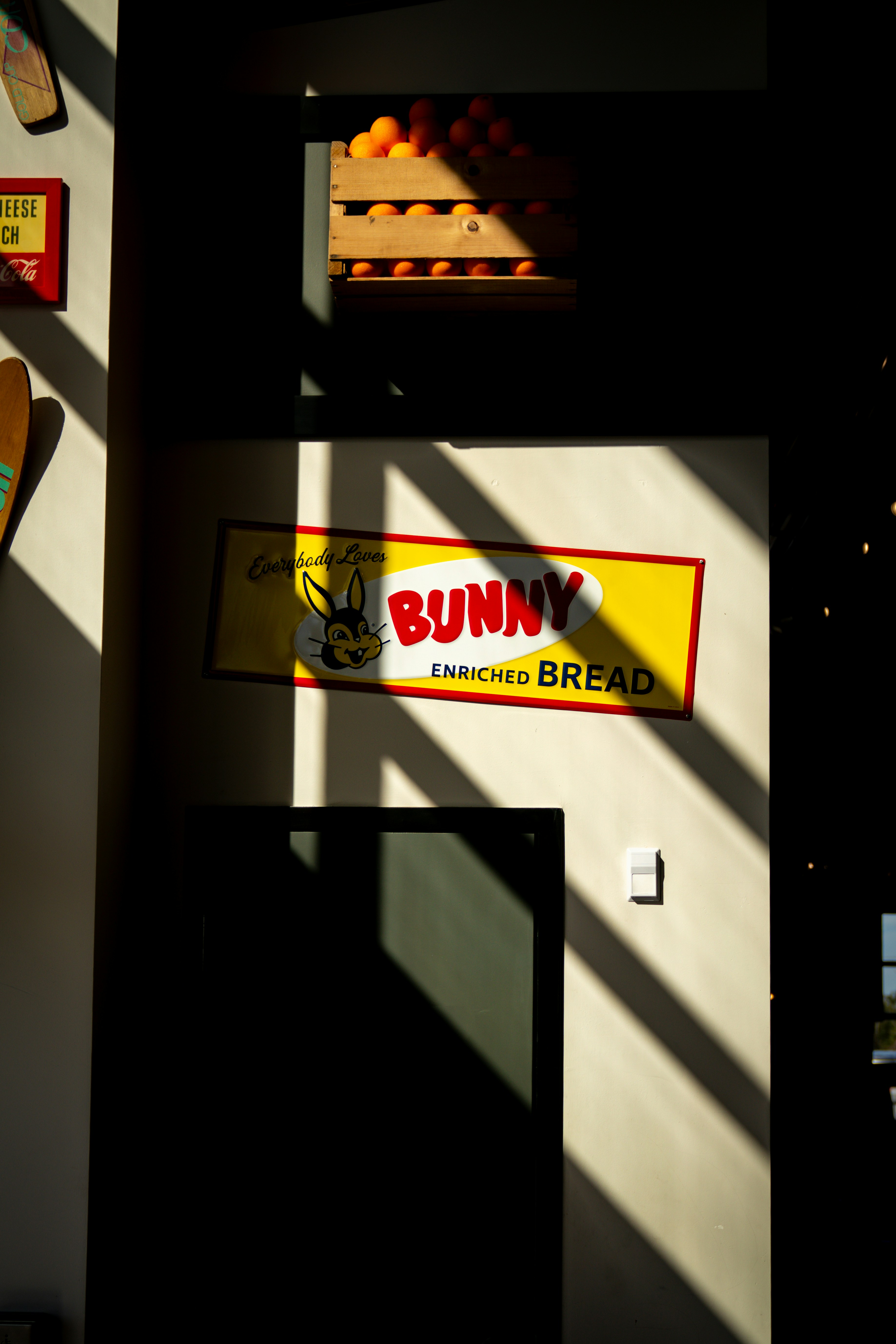 Bunny enriched bread sign with oranges above