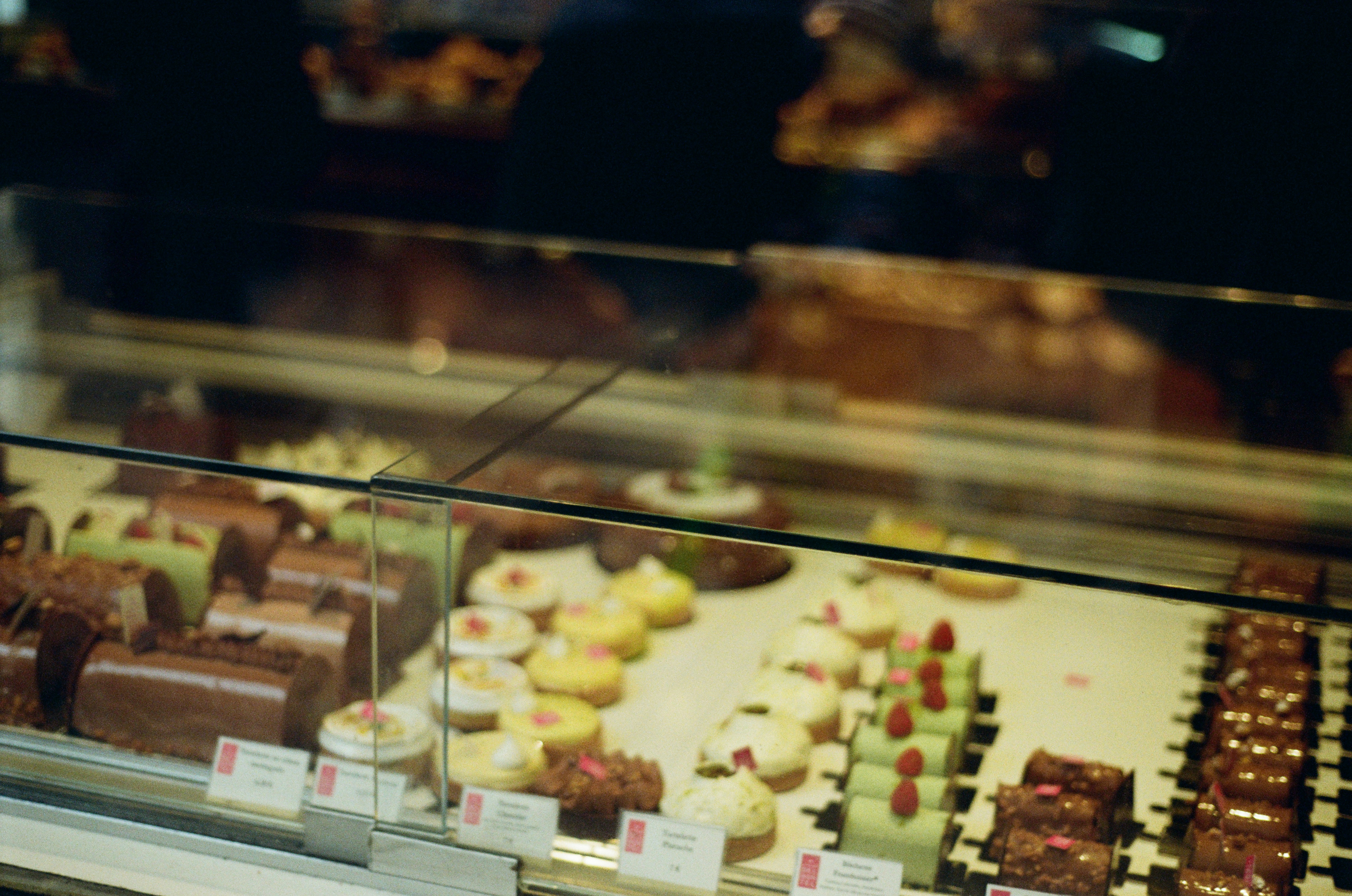 Assortment of delicious pastries in a display case.