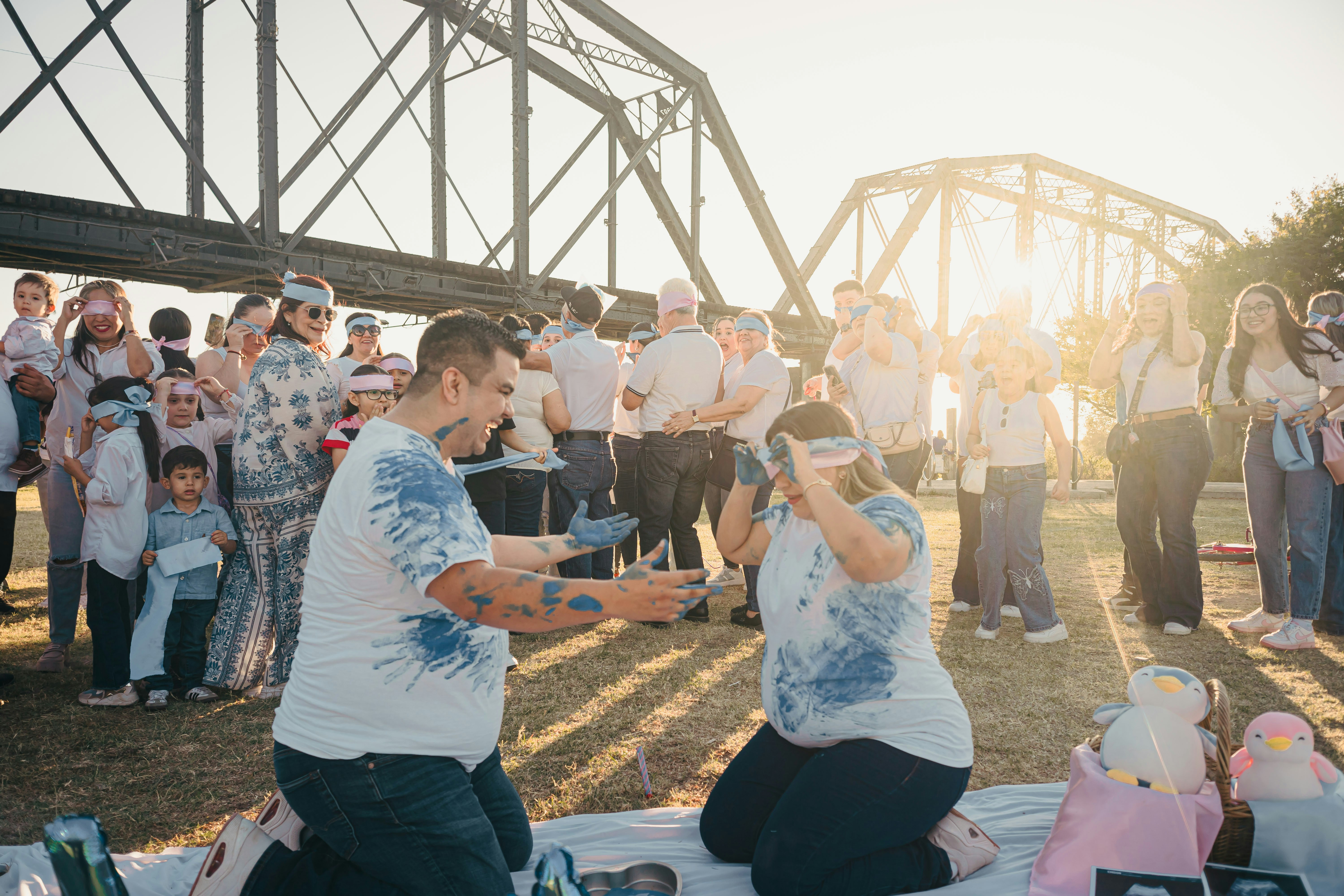 Couple reveals gender with blue paint splatter