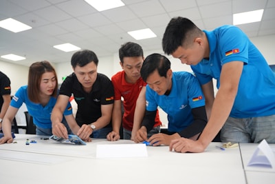 Team collaborating on a project at a table.