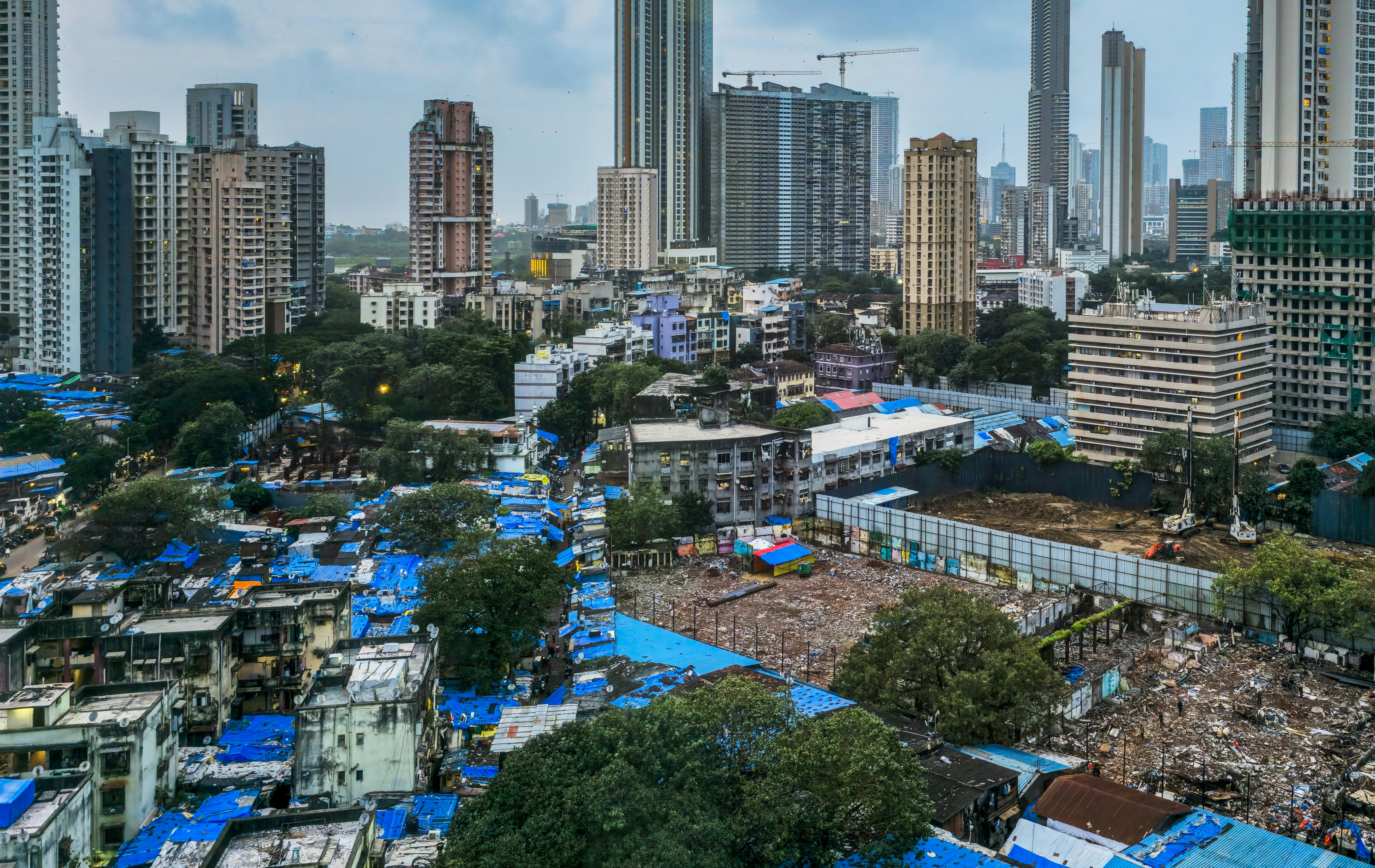 Urban sprawl with informal settlements and skyscrapers