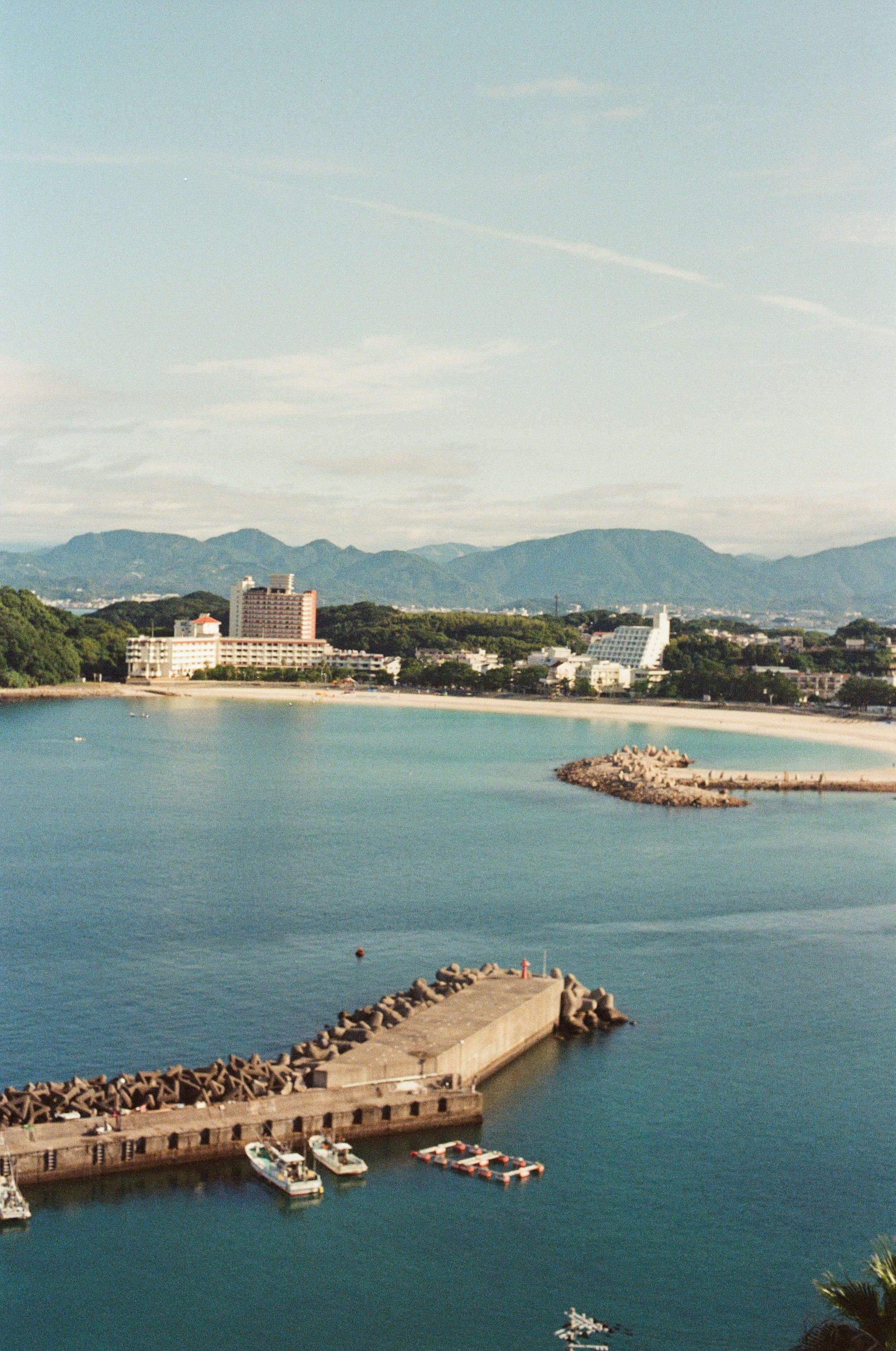 Coastal town with buildings and boats by the water