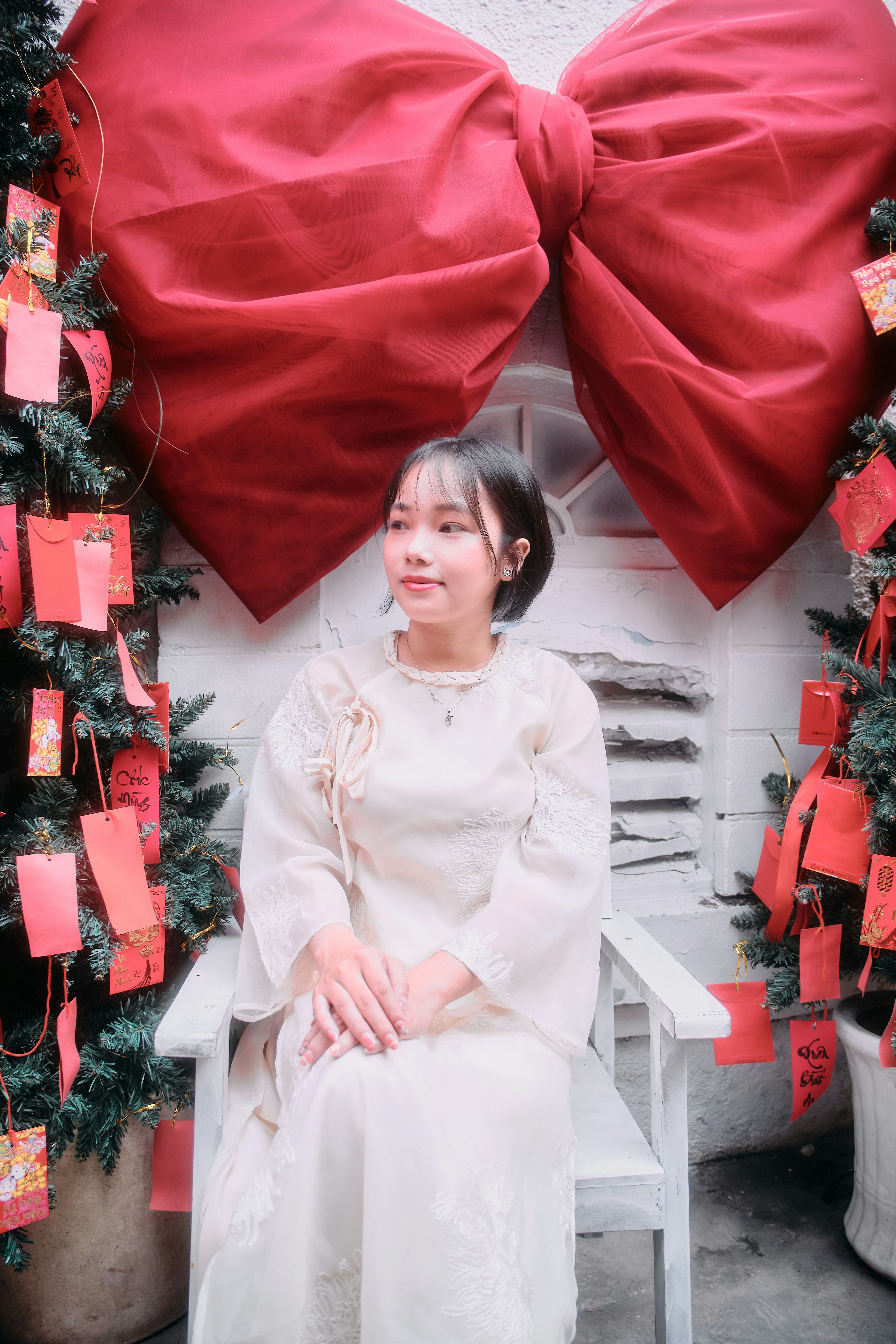 Young woman in traditional dress with festive decorations
