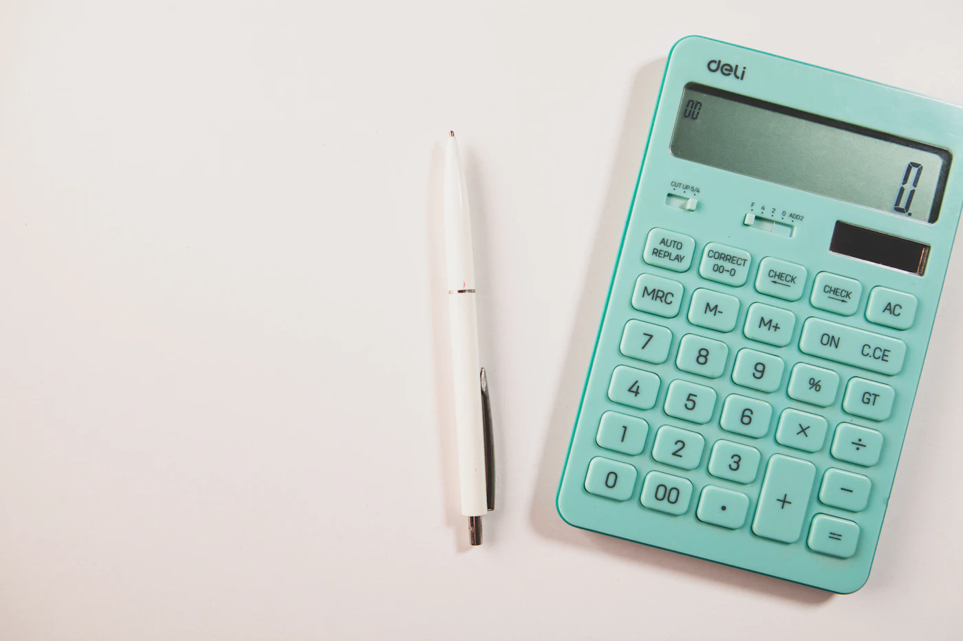 Calculator and notebook for planning an Orlando family vacation budget