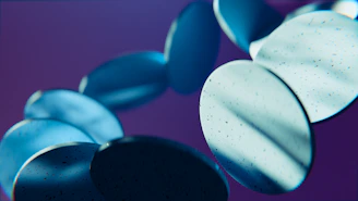 Blue circular objects floating against purple background