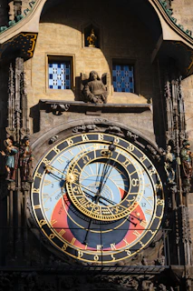 An ornate astronomical clock face with intricate details.
