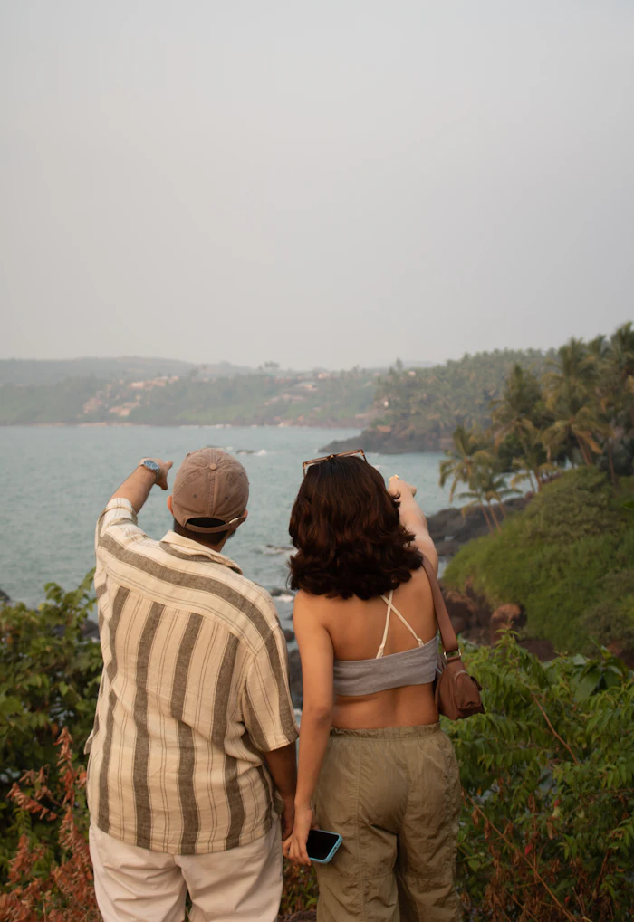 An older couple looking out over a harbour view