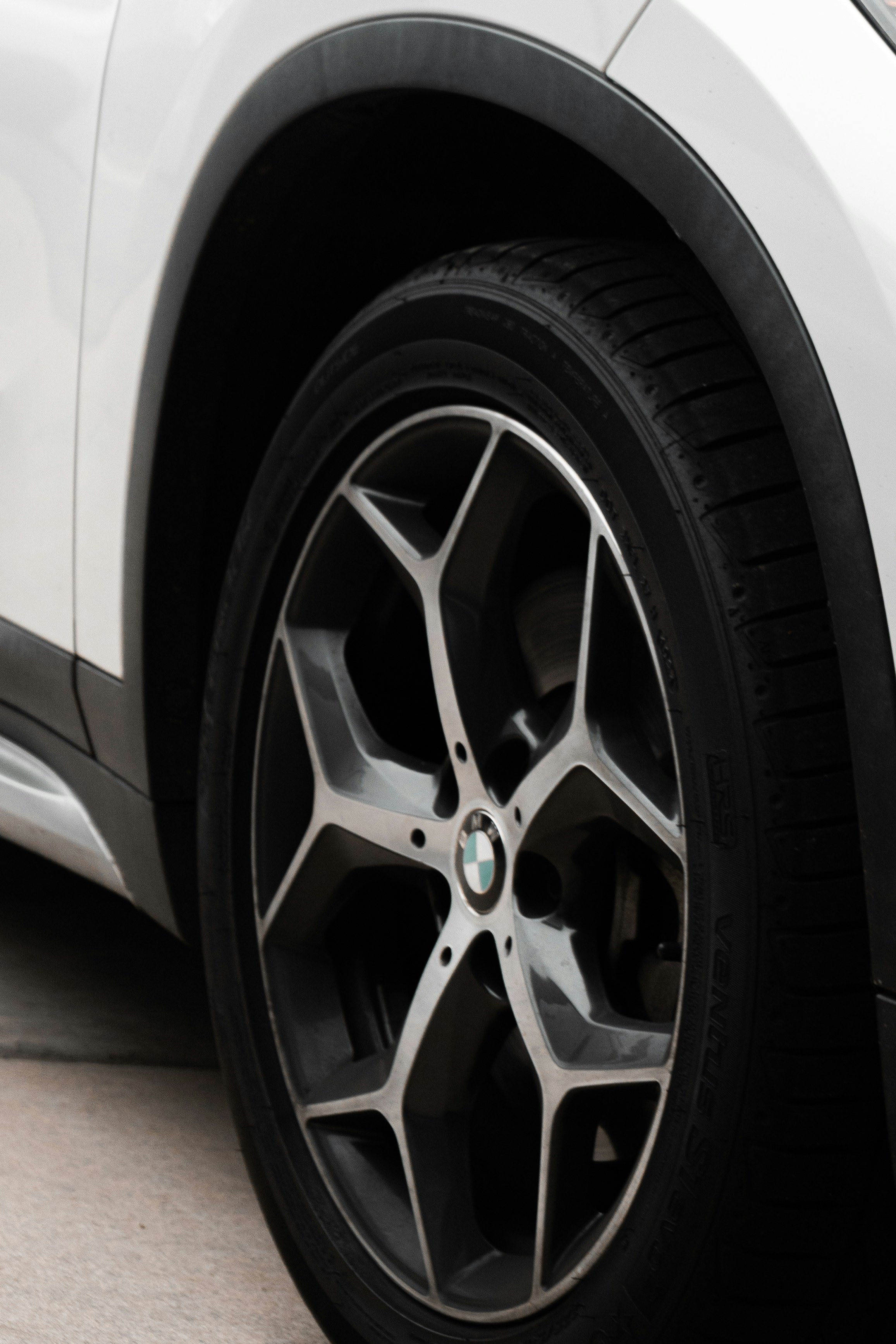 Close-up of a modern car wheel with alloy rim.