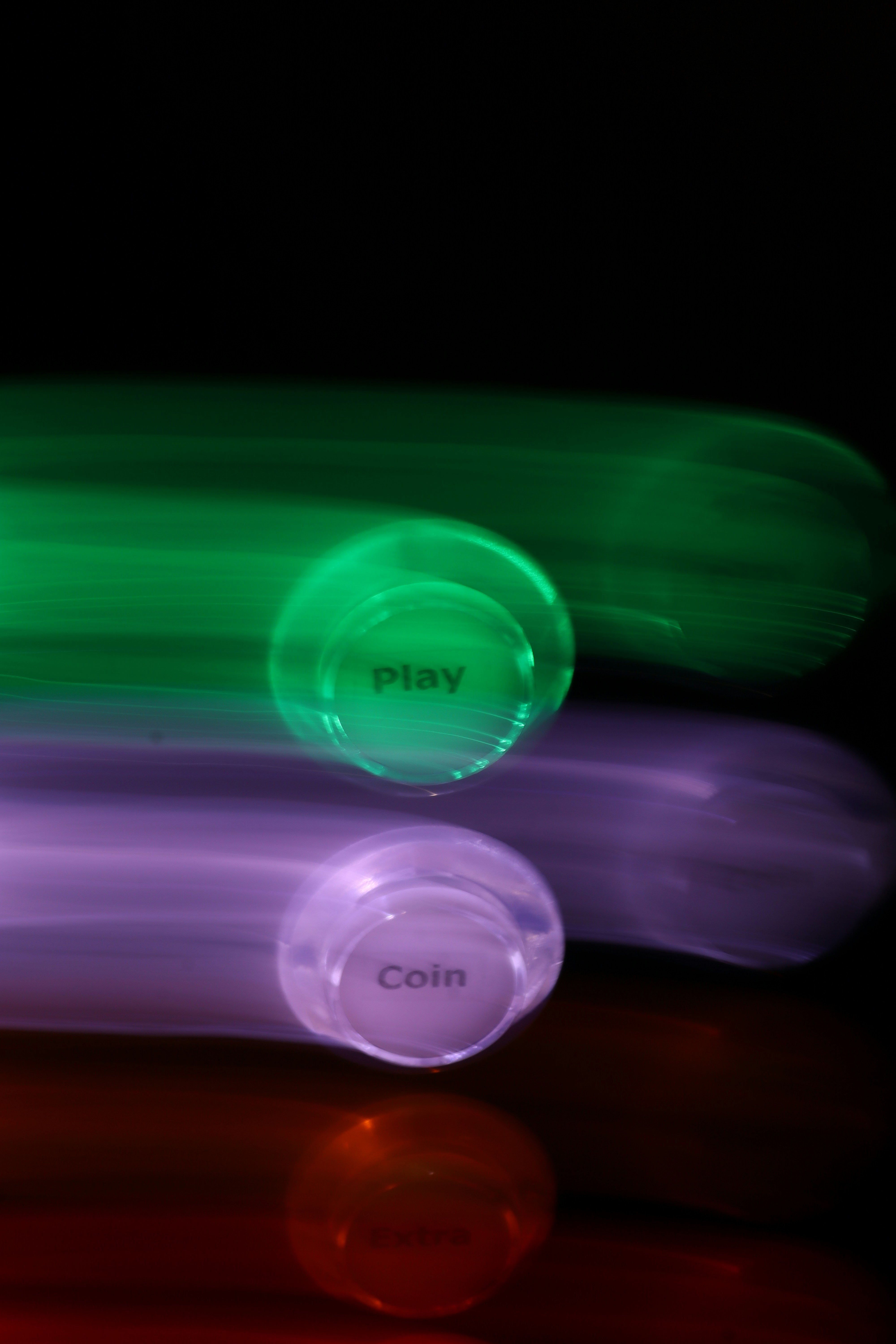 Green and purple lights with buttons on buttons.