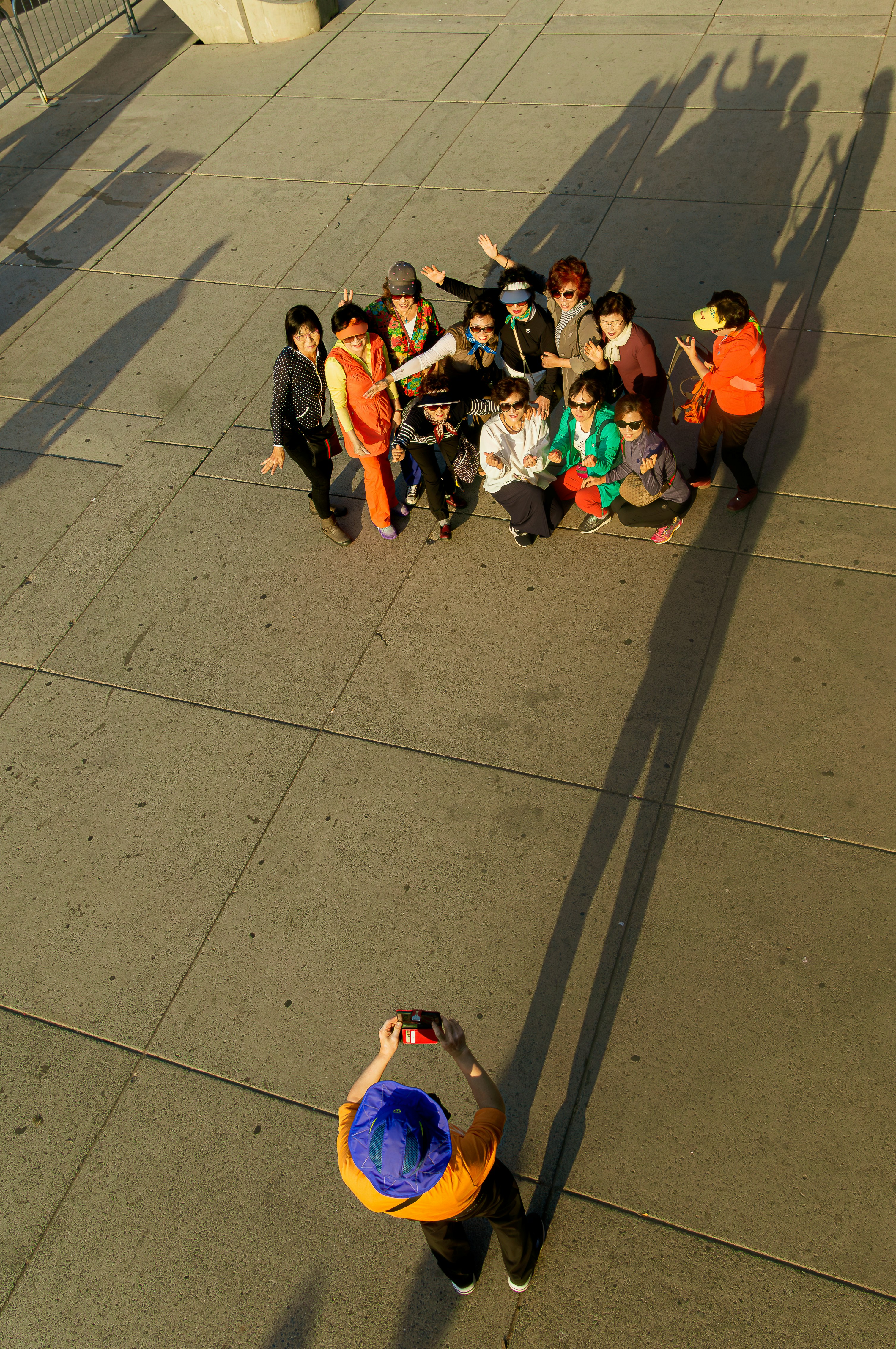 A group of people posing for a photo outdoors.