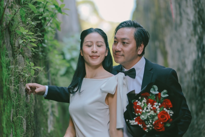 Romantic couple in formal wear with roses