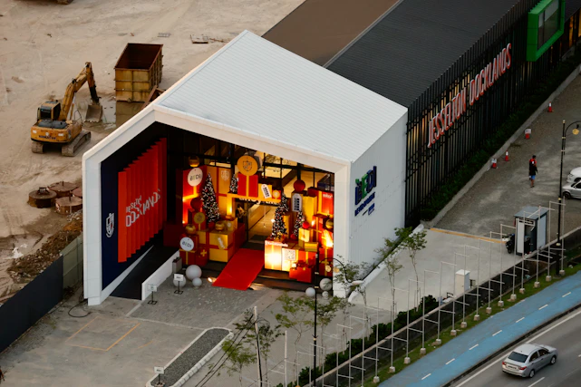 A modern building with a red carpet entrance