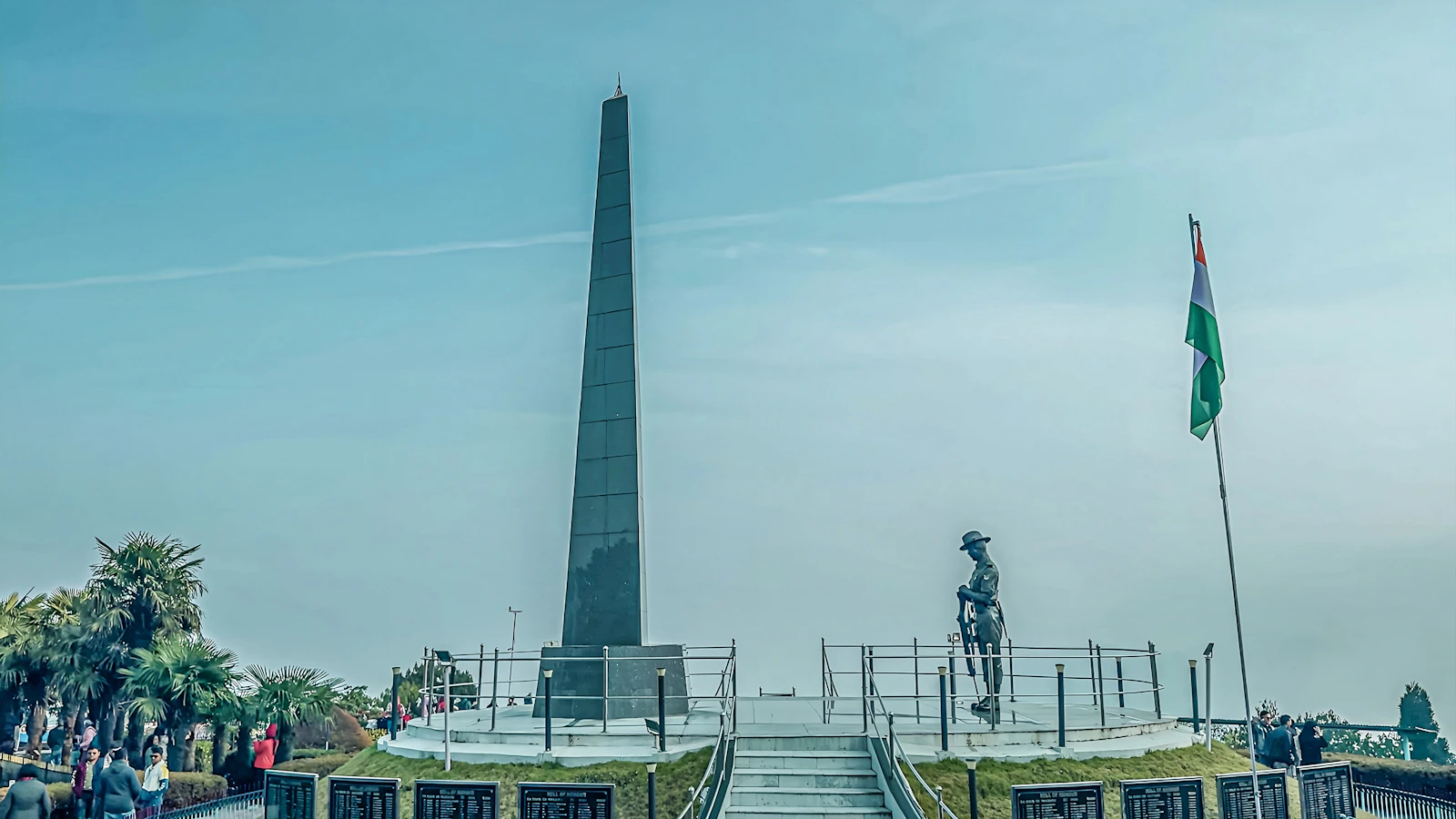 The Gorkha war memorial at Batasia Loop, a tall obelisk, bronze soldier and Indian flag inside the garden the railway circles