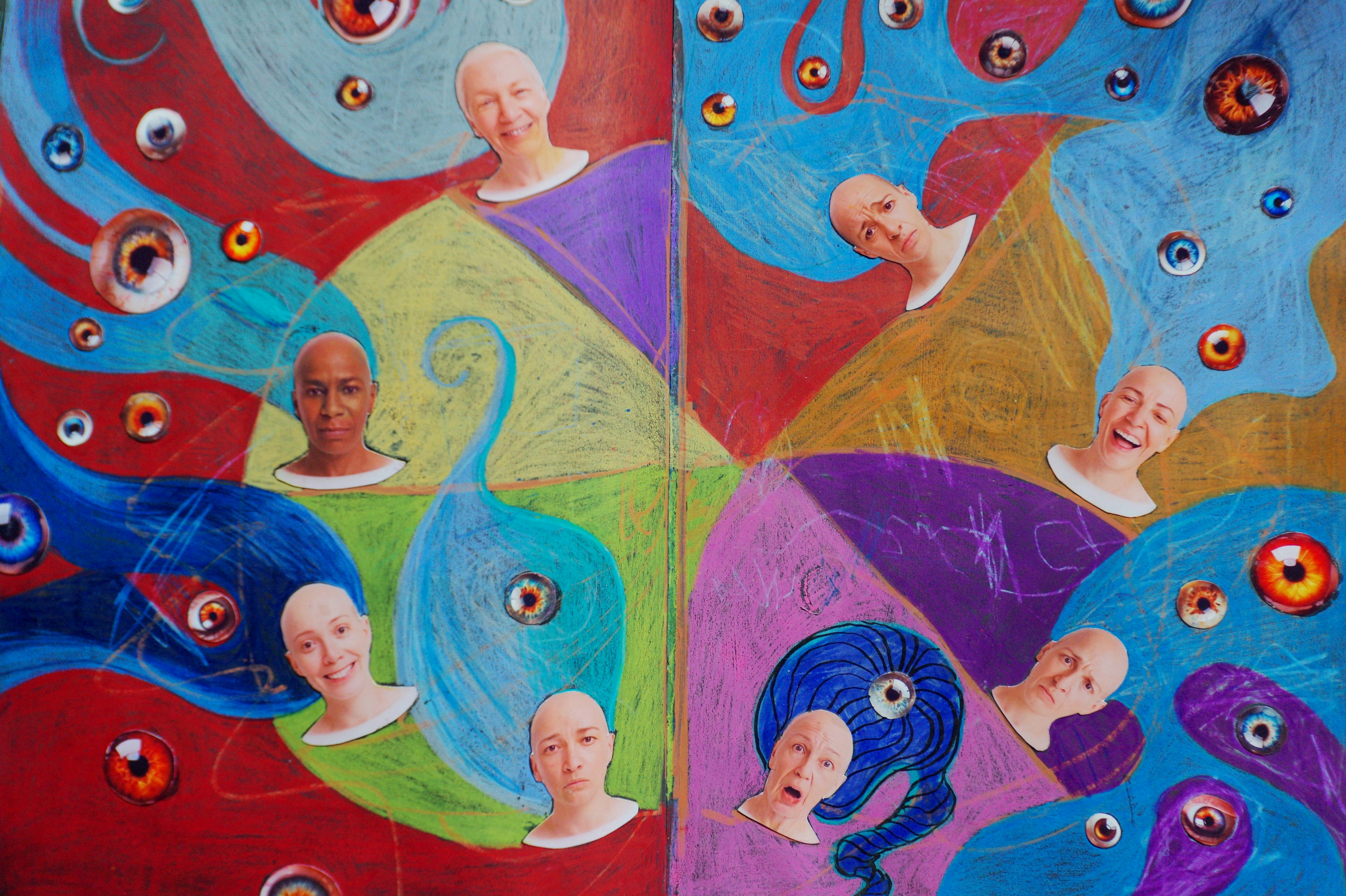 Abstract art with floating heads and eyes