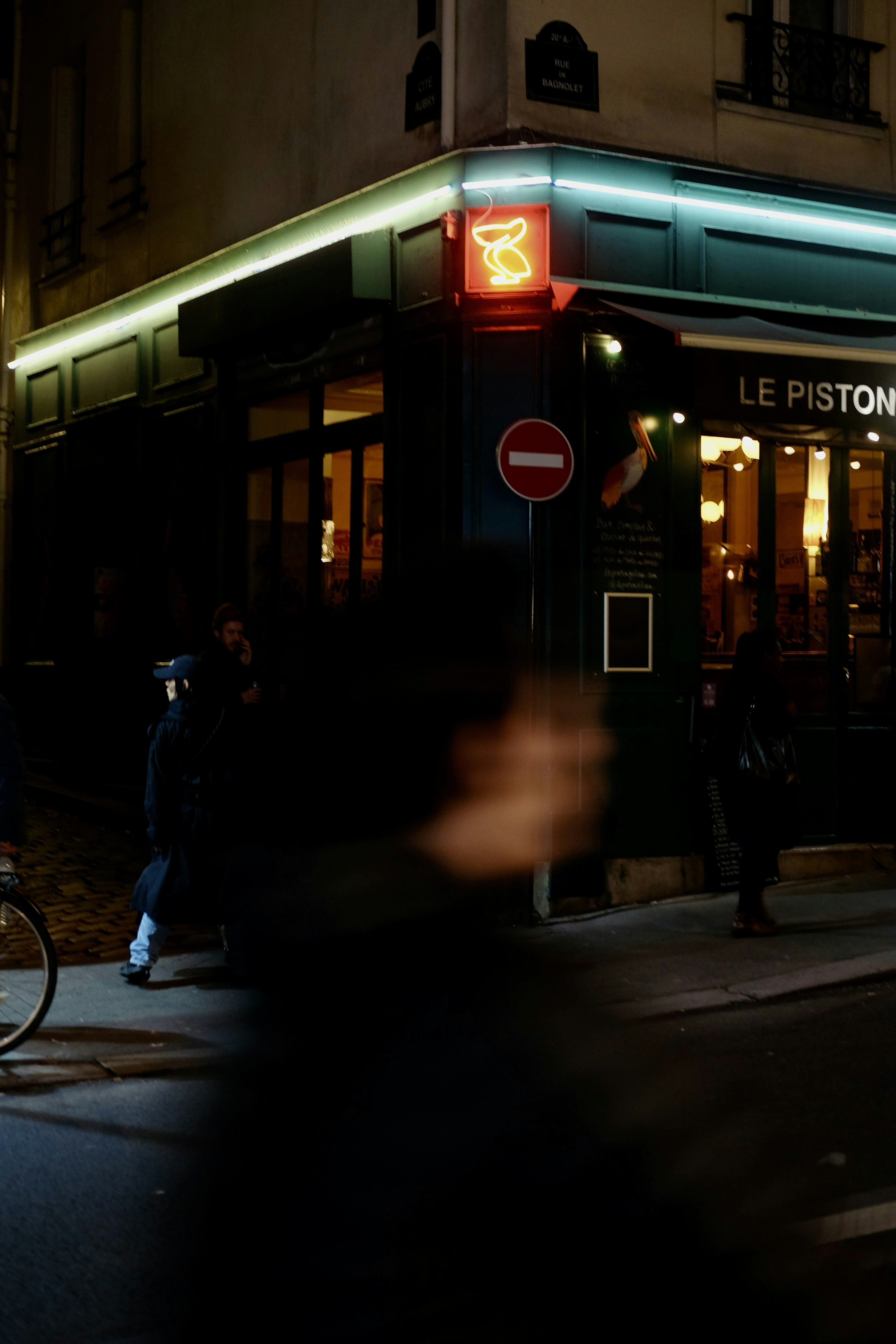 Corner cafe at night with neon lights
