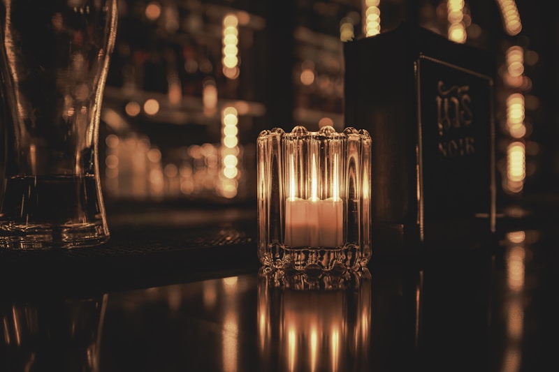 luxury candle in elegant bar setting