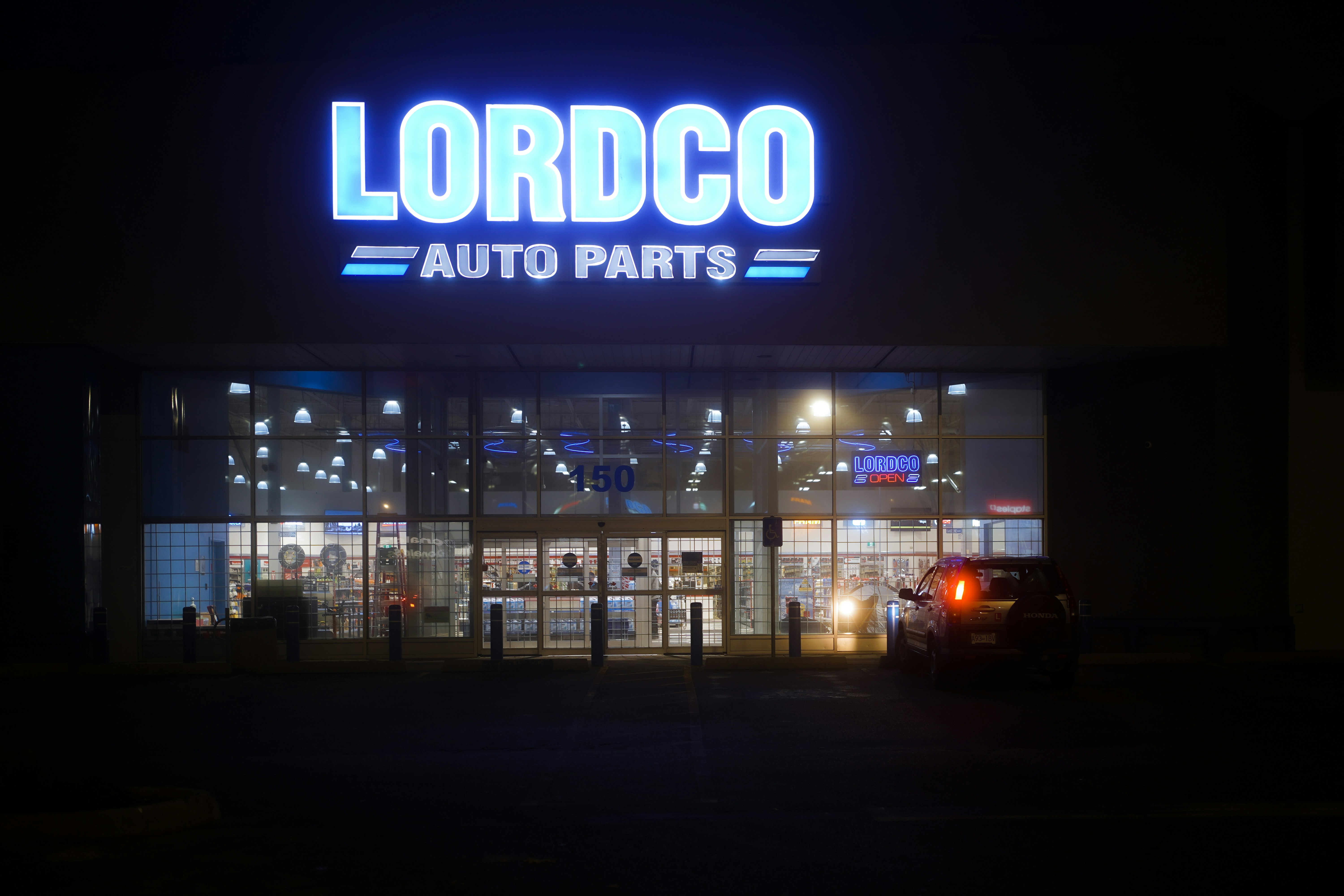 Lordco auto parts store at night