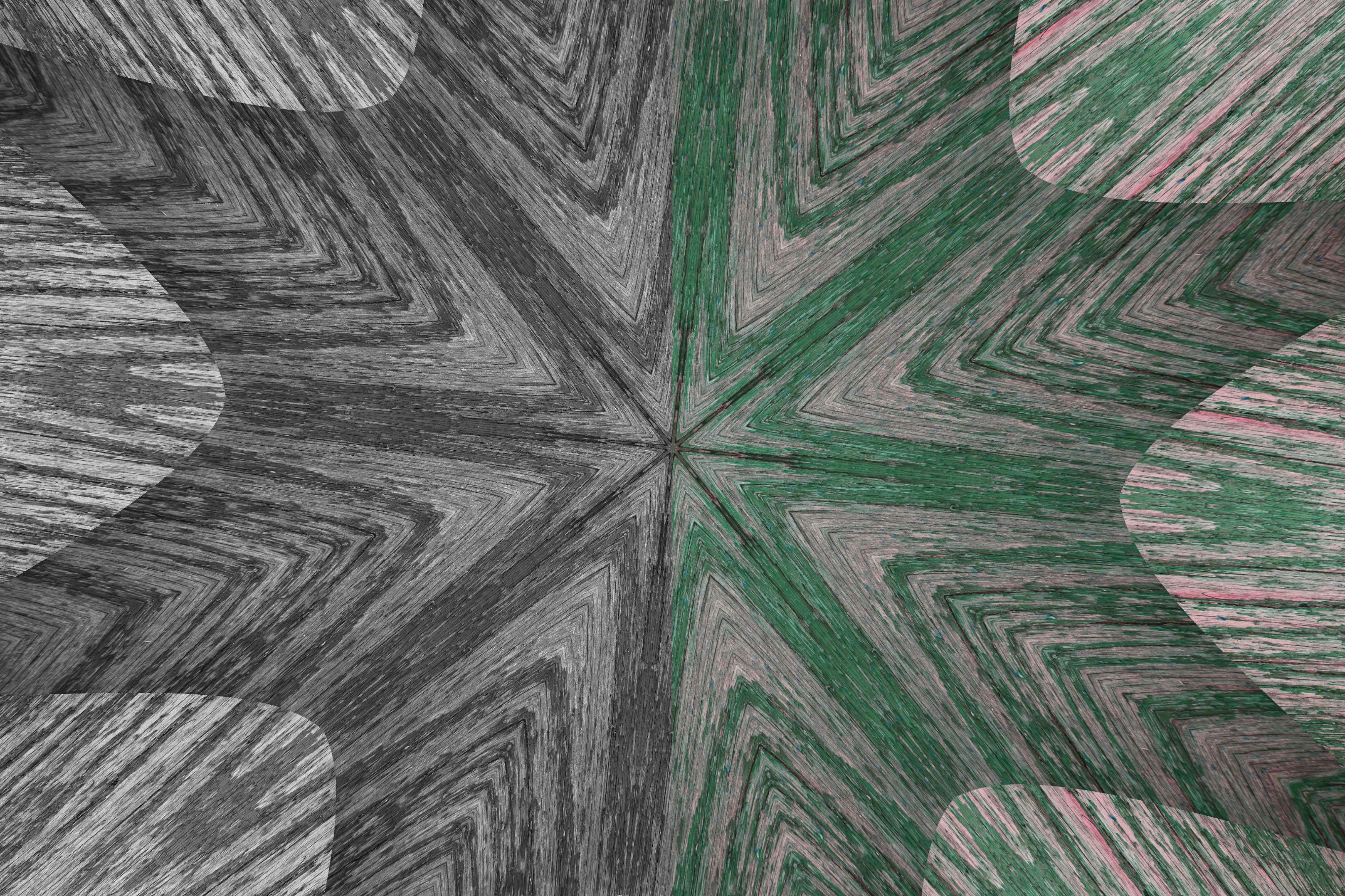 Abstract kaleidoscopic pattern with green and gray tones
