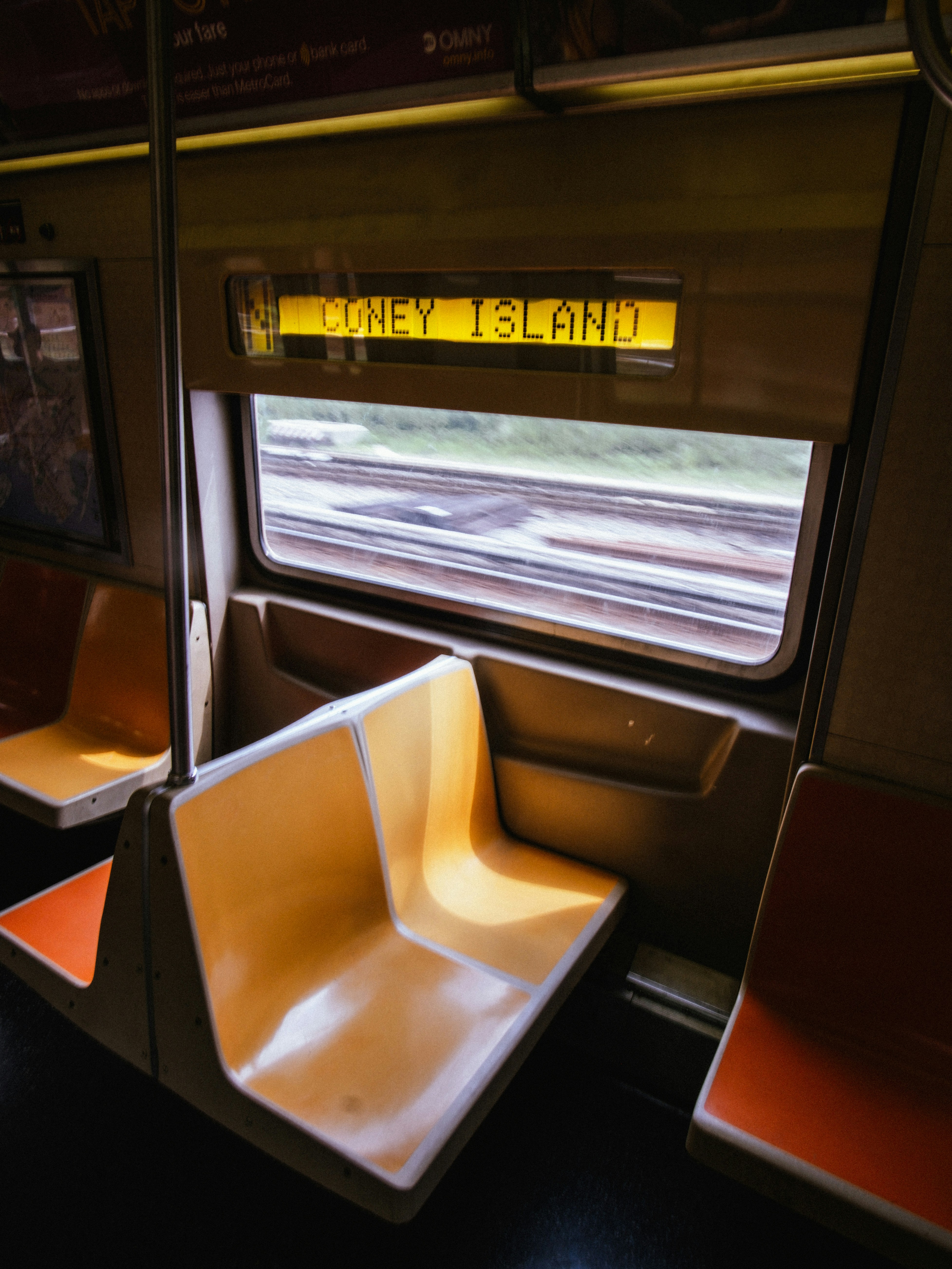 Photo of Train interior with "coney island" destination sign. by Nicolas Savignat