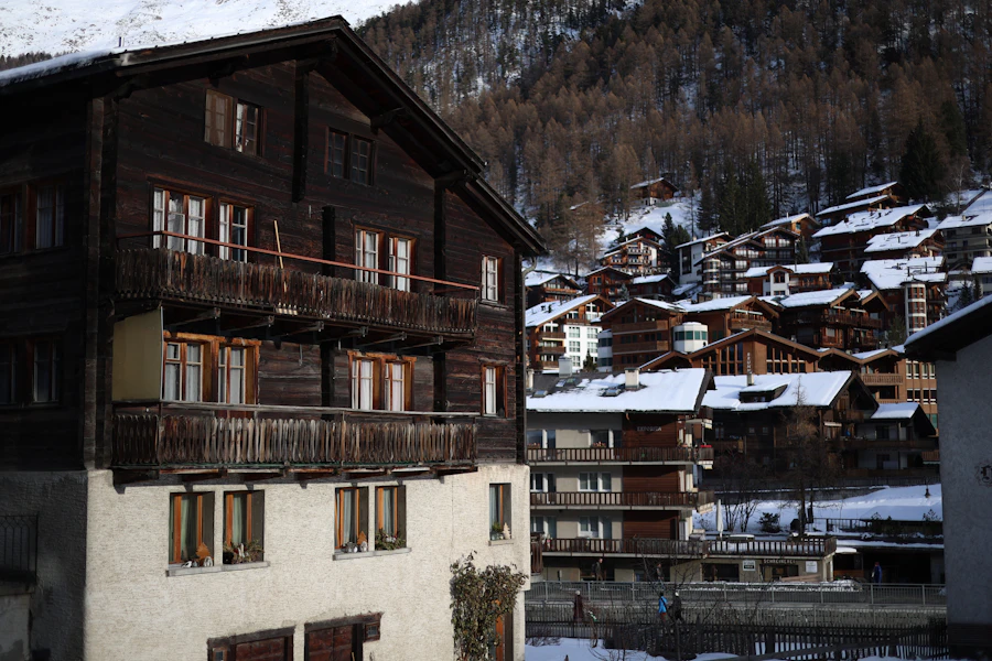Wooden chalets on snowy Whistler mountainside