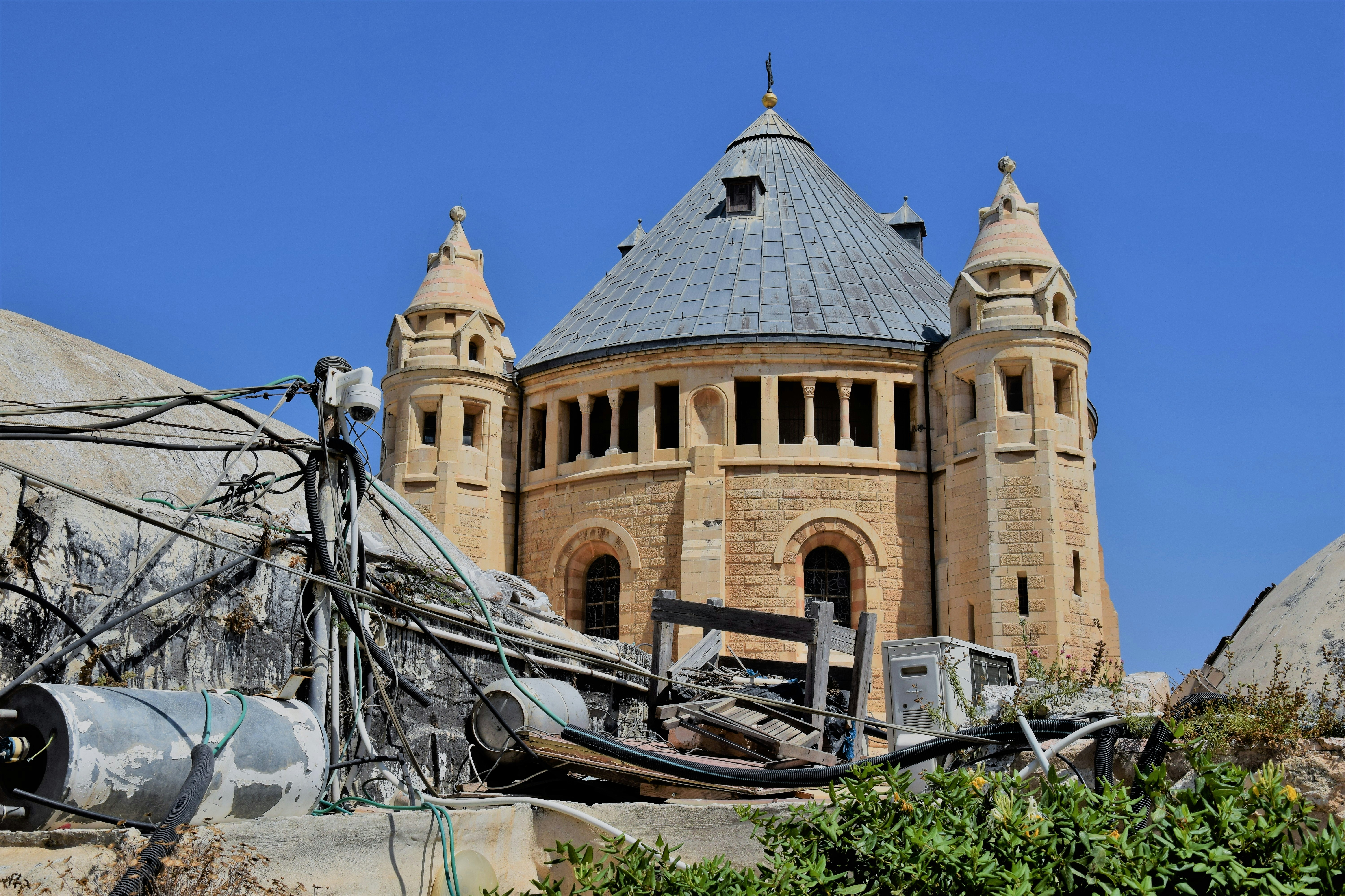 An old building with a domed roof and towers.