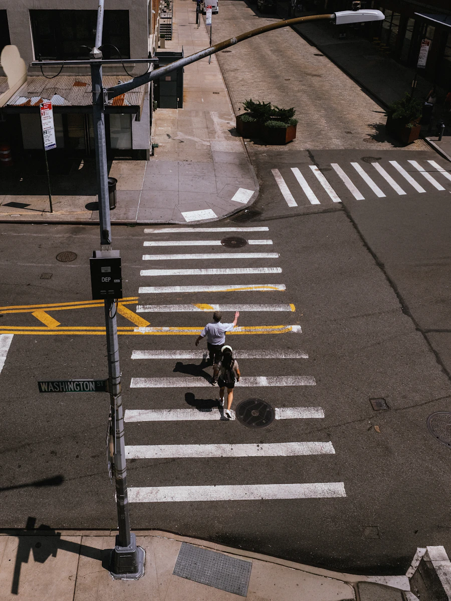 Pedestrians crossing at a city intersection