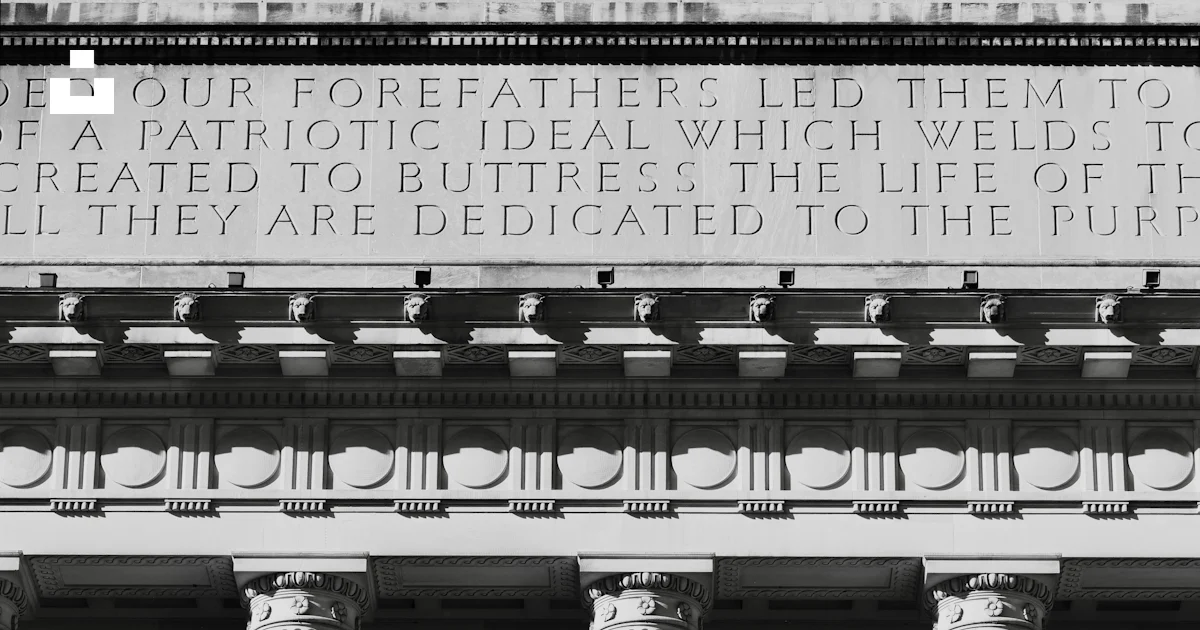 Building With Inscription Classical columns and inscription on a building facade photo – Free ...