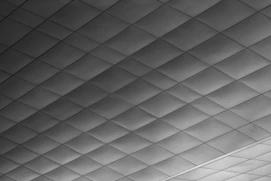 Quilted gray ceiling panels with diamond pattern
