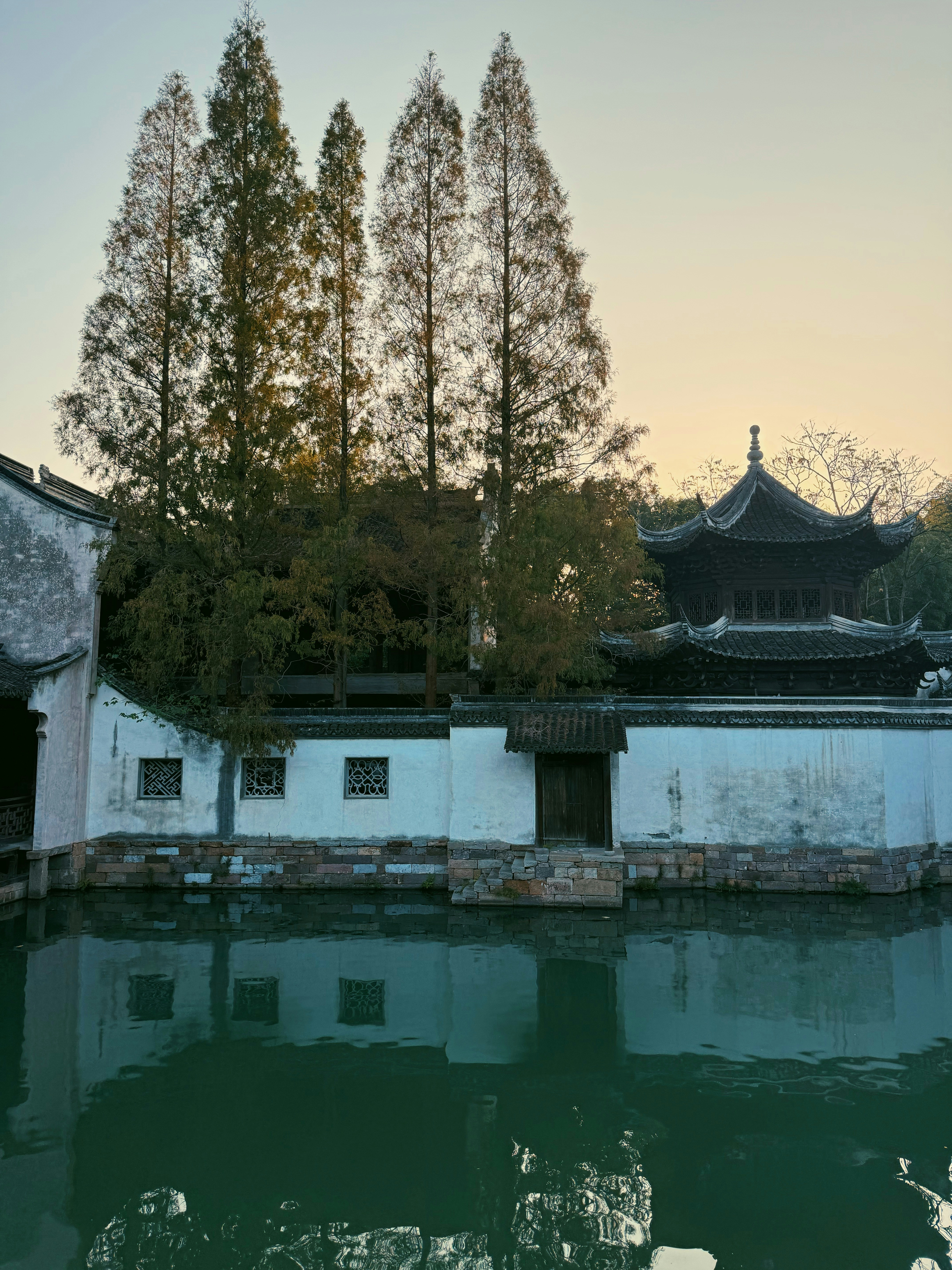 Traditional chinese architecture reflected in calm water