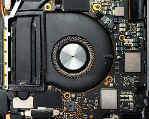 Close-up of a computer fan and circuit board