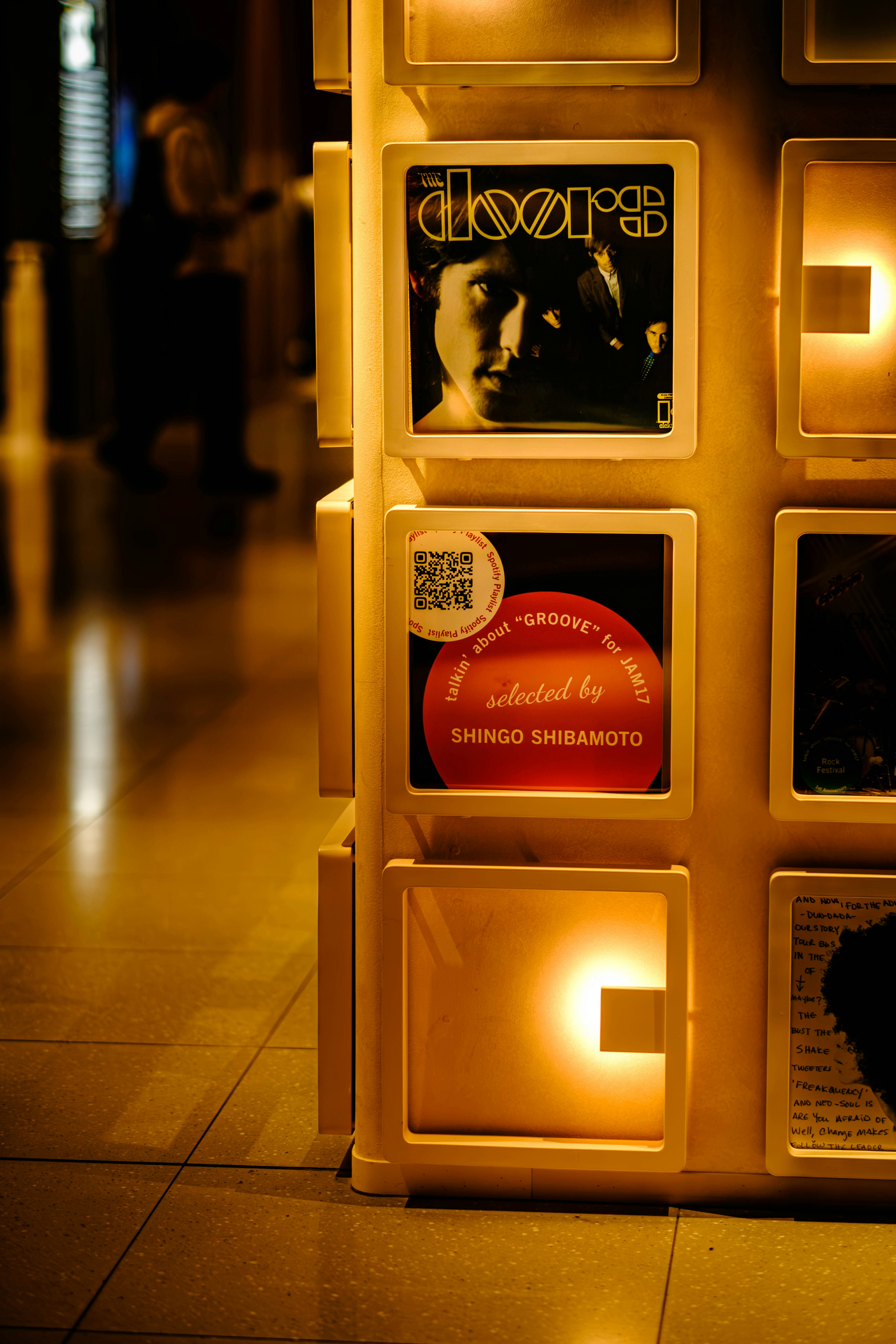 Display of records with album art and lighting