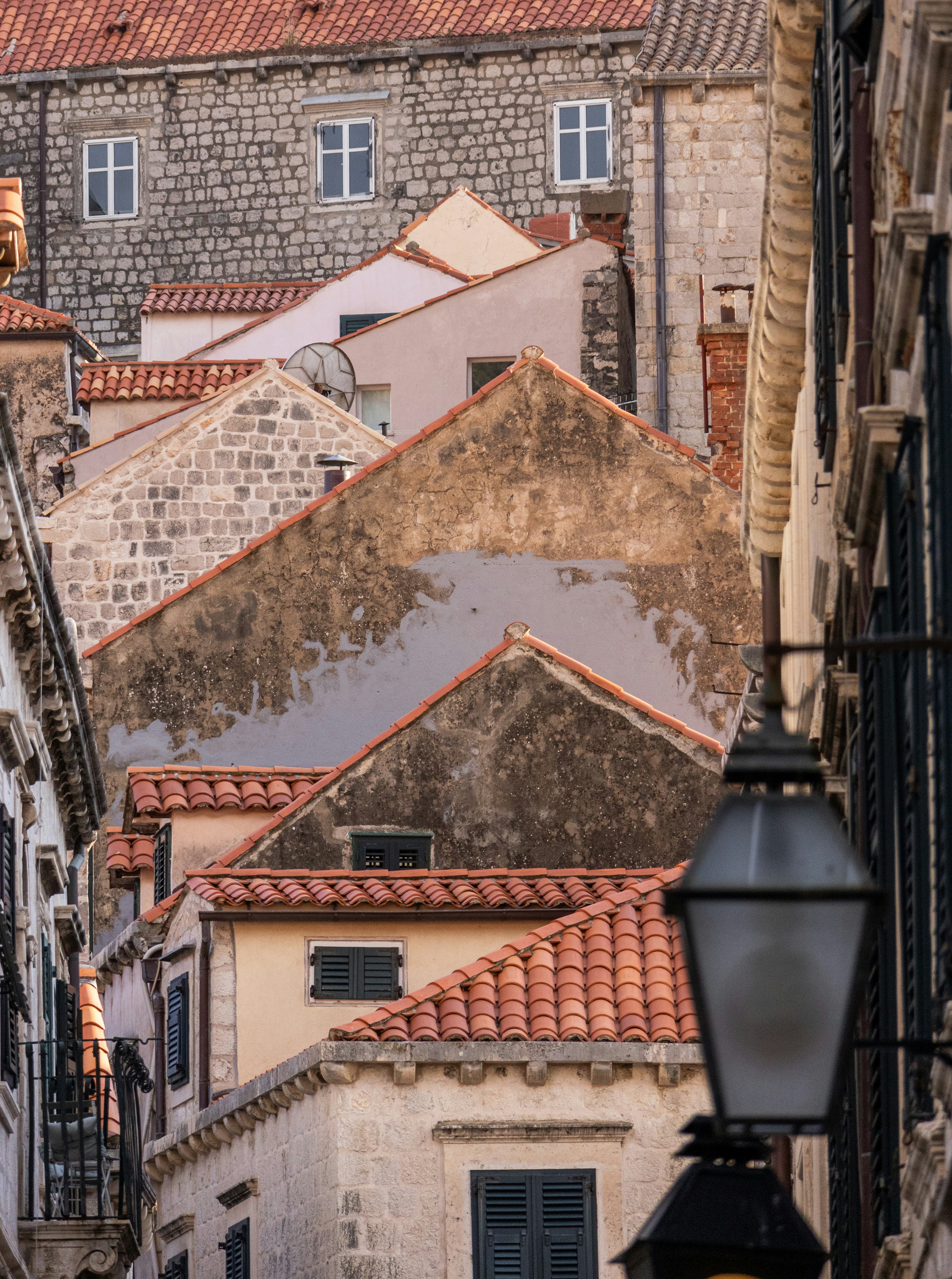 Rooftops and ancient stone buildings in a european city.