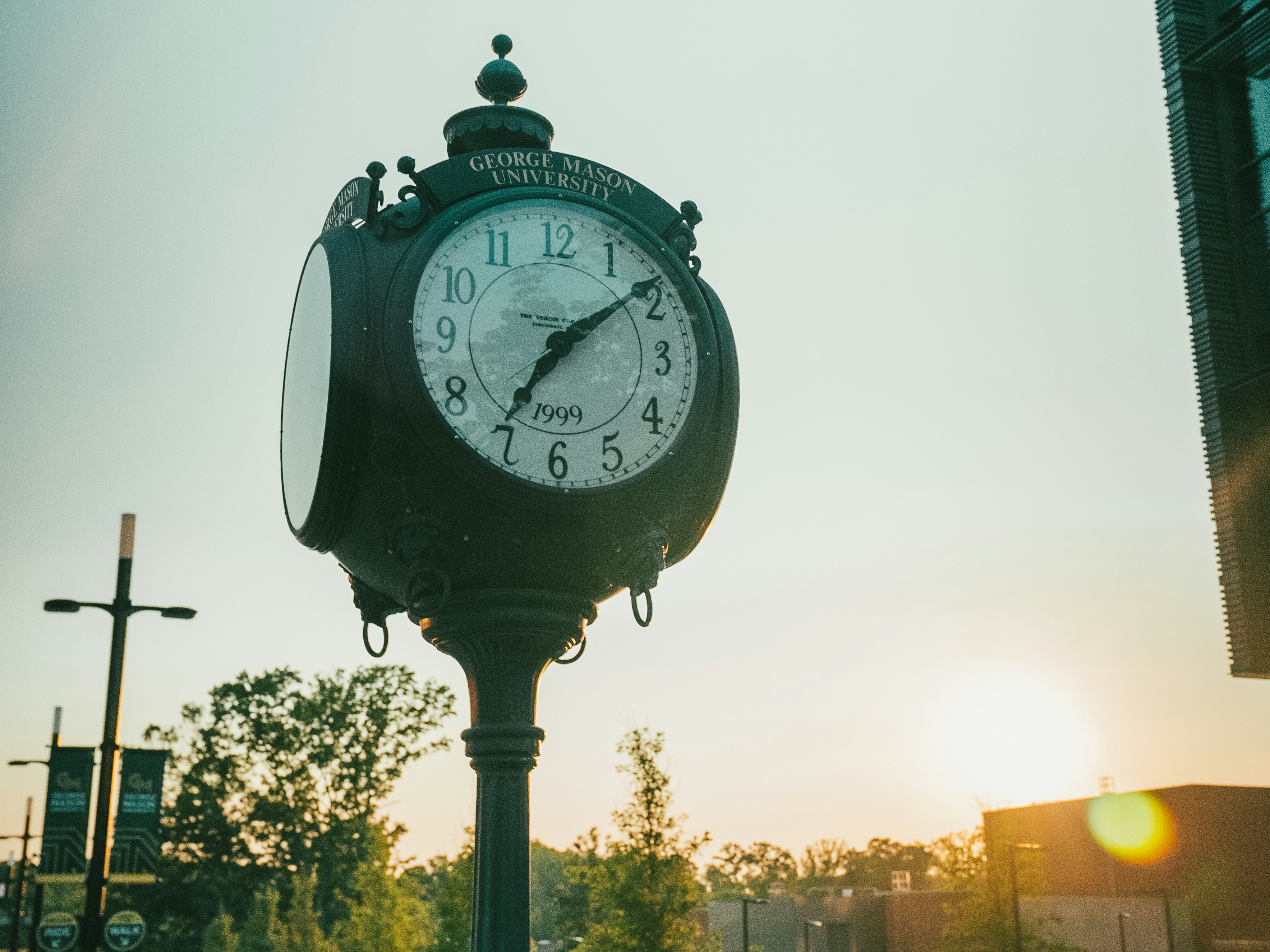 A vintage clock tower stands tall against the sky.