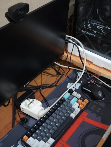 Computer setup with keyboard, mouse, and monitor.