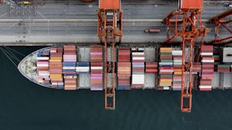 Cargo ship loaded with colorful containers at a port