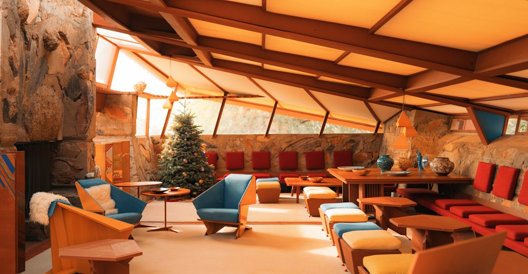 Cozy living room with christmas tree and unique architecture